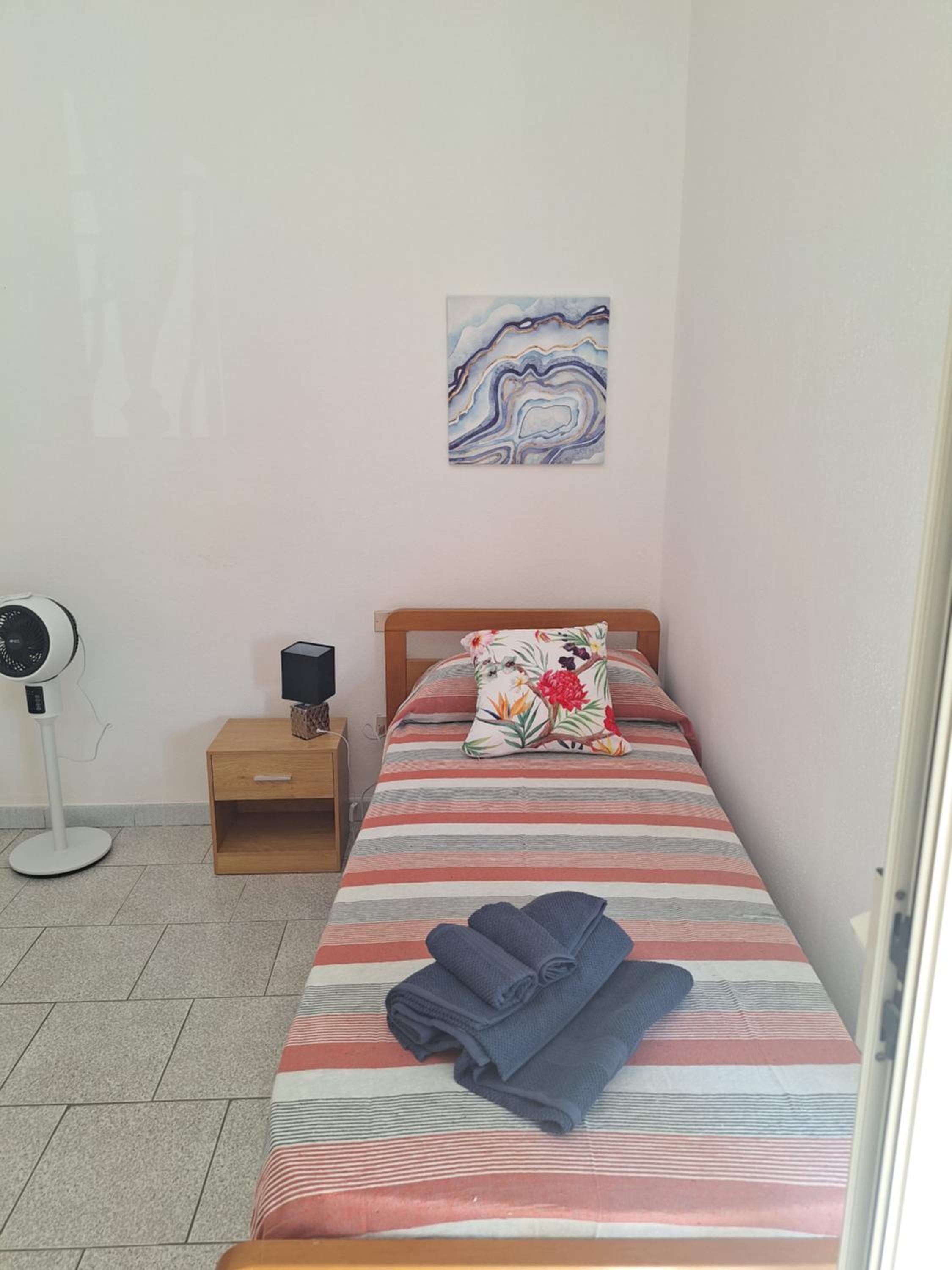 Three-Bedroom Apartment photo 1