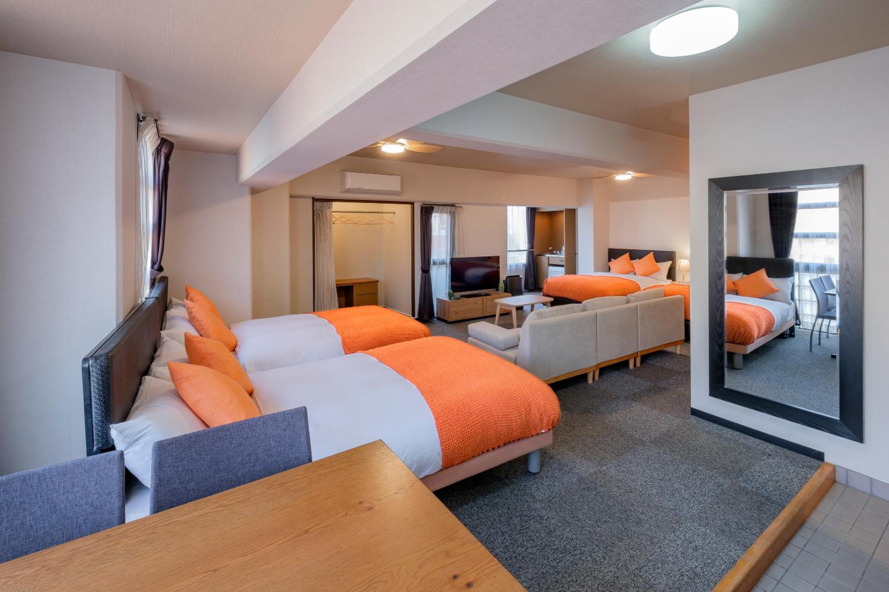 Junior Suite Room (1 Double Bed and 3 Small Double Beds and 1 Sofa) - Non-Smoking - Cleaning Fee Extra - No Cleaning for Consecutive Night Stays photo 3
