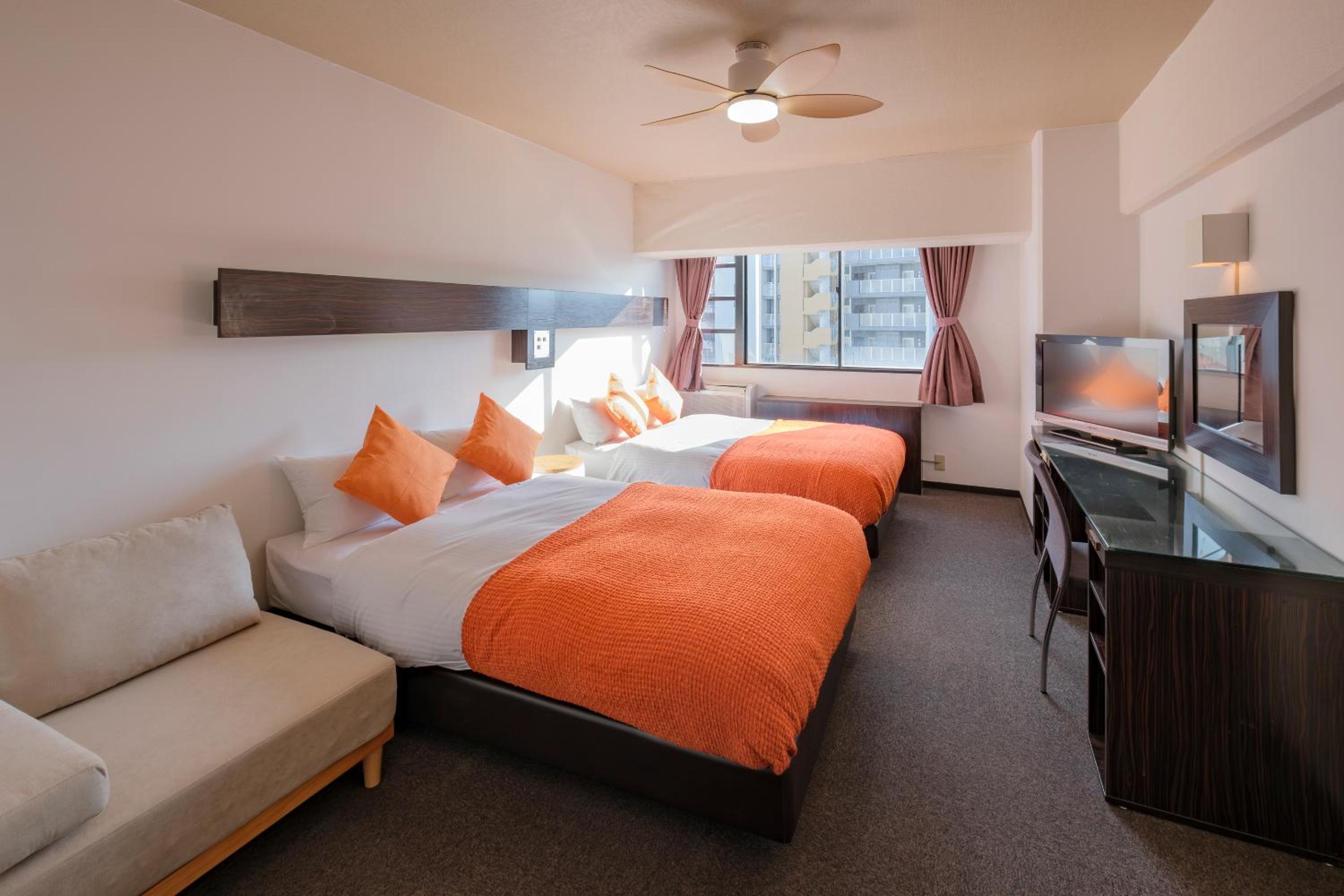 Standard Room (2 Small Double Beds and 1 Sofa) - Non-Smoking - Cleaning Fee Extra - No Cleaning for Consecutive Night Stays