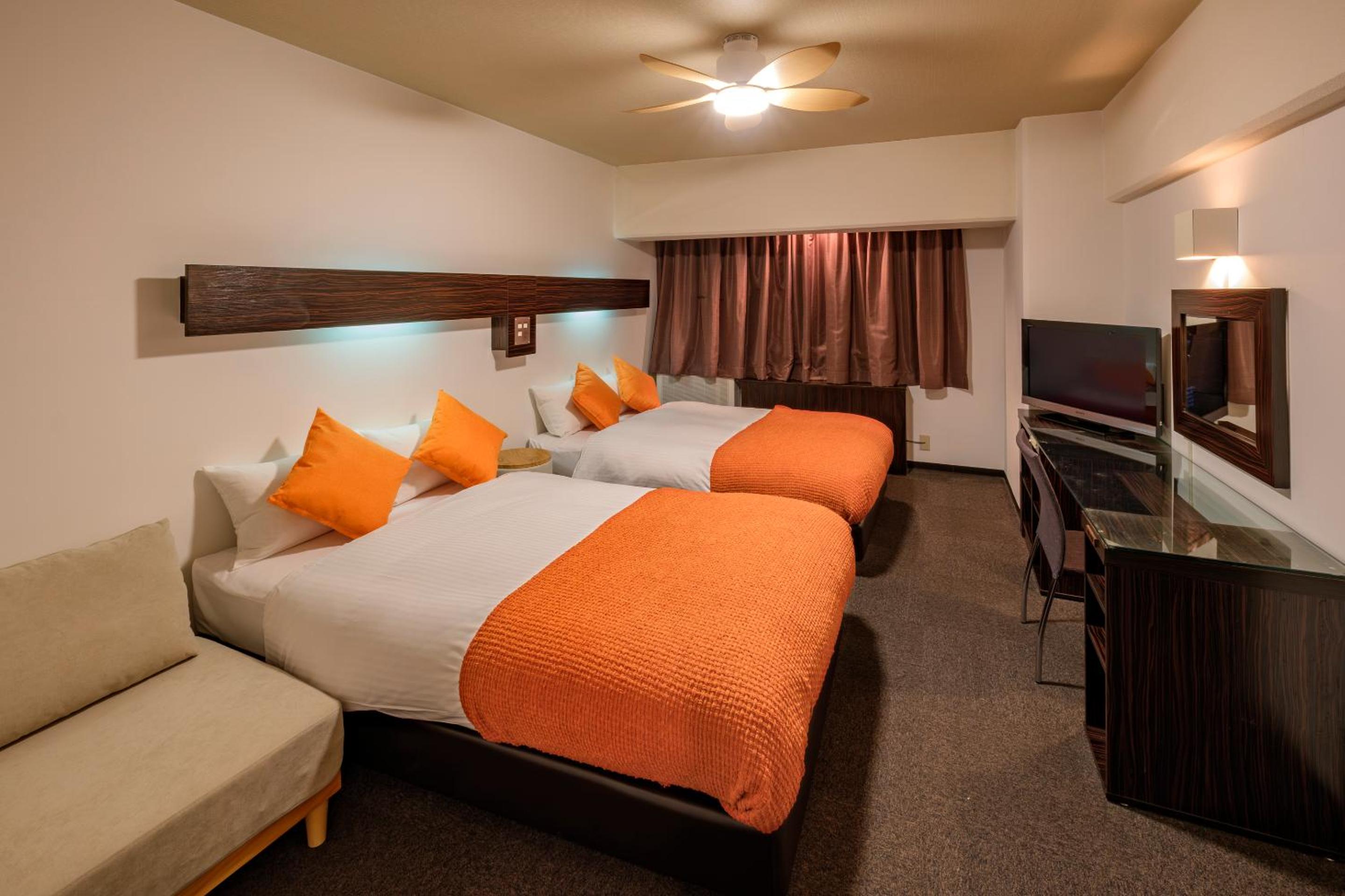 Standard Room (2 Small Double Beds and 1 Sofa) - Non-Smoking - Cleaning Fee Extra - No Cleaning for Consecutive Night Stays photo 3