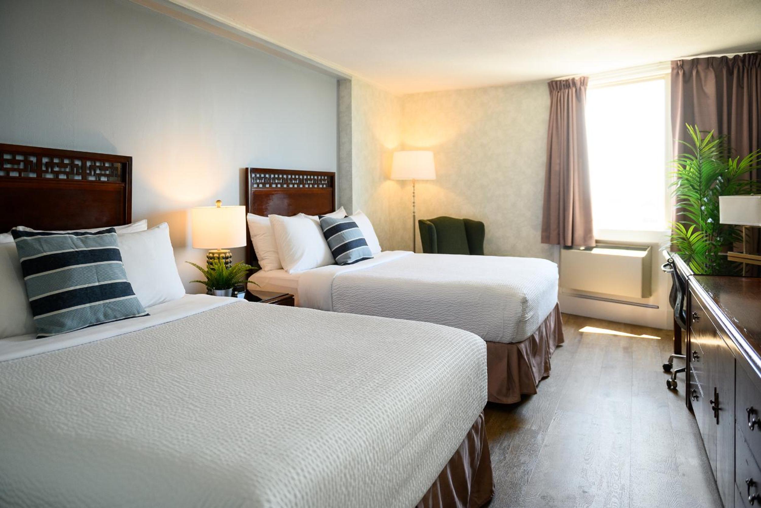 Standard Queen Room with Two Queen Beds - Photo 1