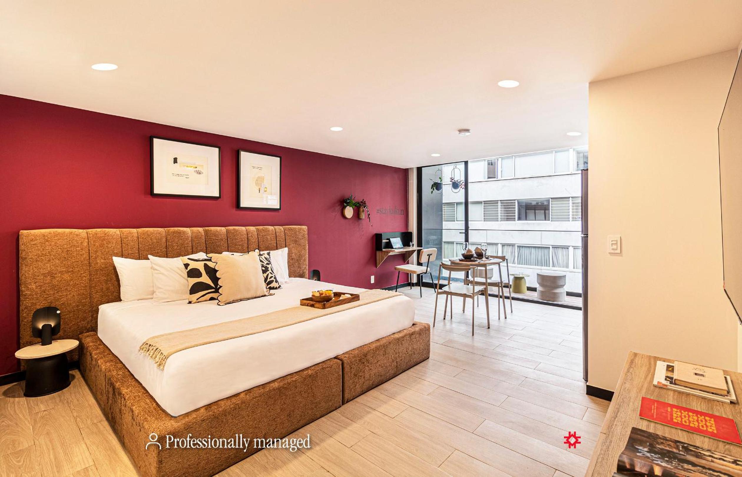 Studio apartment with king bed and balcony