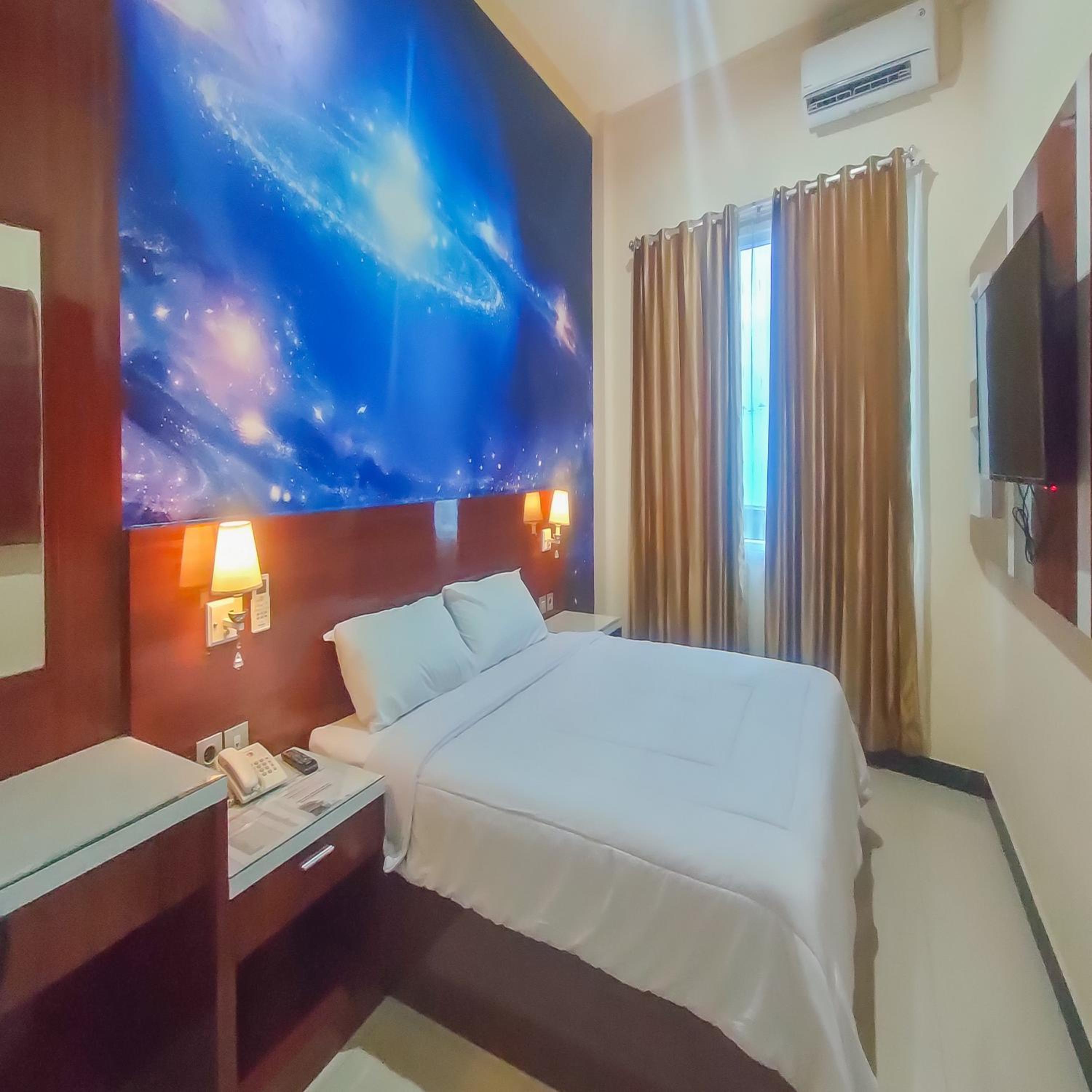 Deluxe Room - Photo 1
