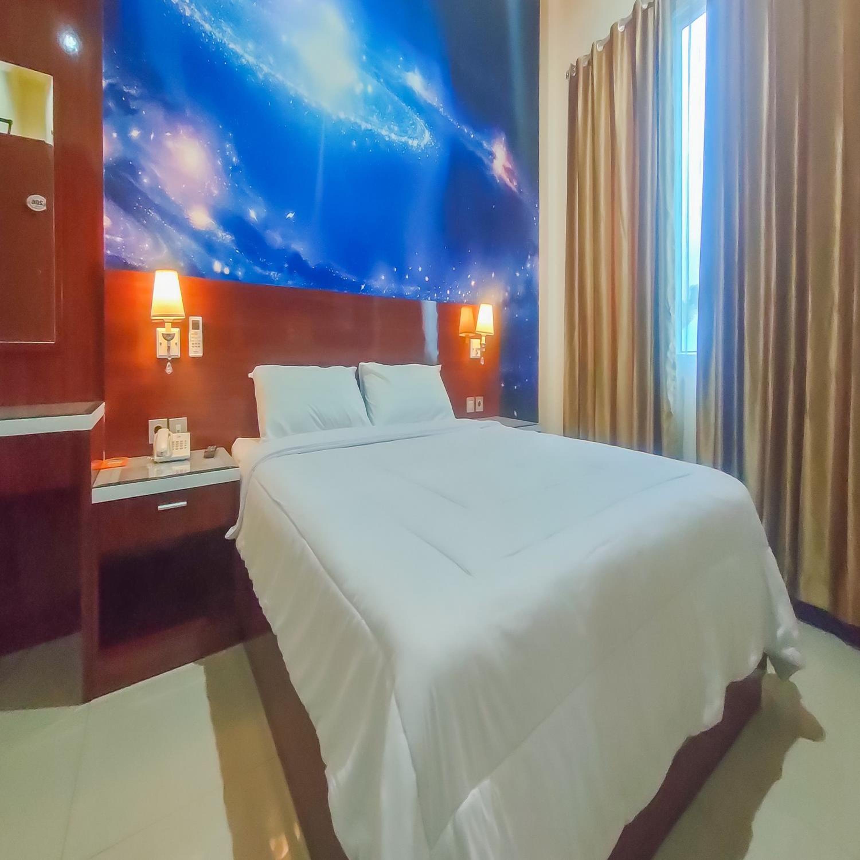 Deluxe Room - Photo 2