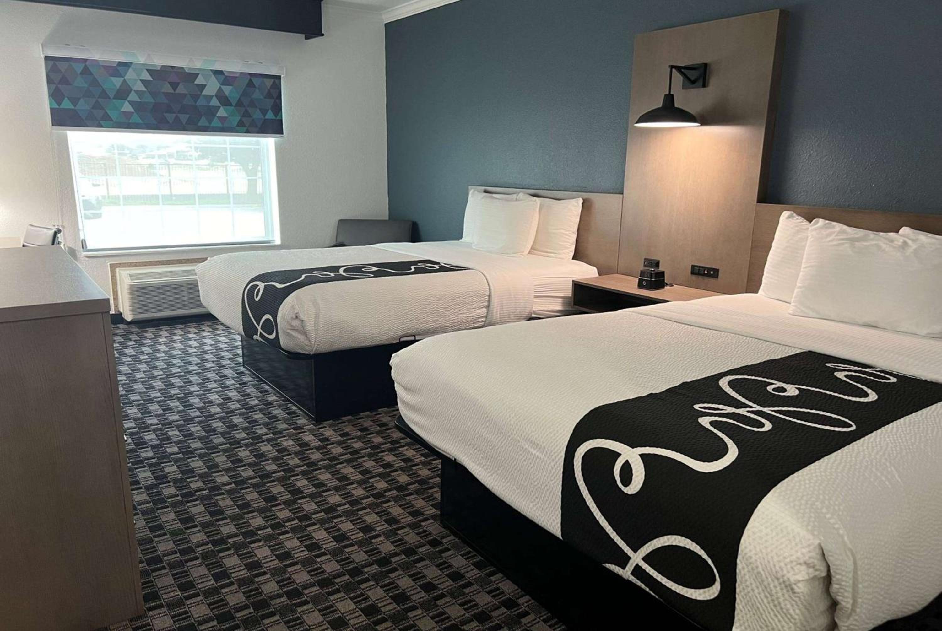 Deluxe Queen Room with Two Queen Beds - Photo 1