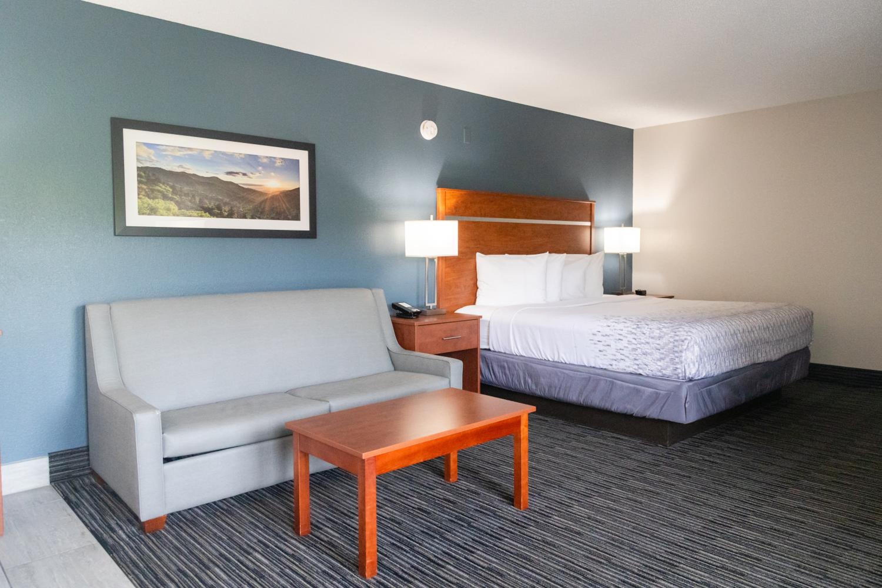 King Room w/ Soaking Tub, Sofa Bed w/ fire place & private balcony photo 1