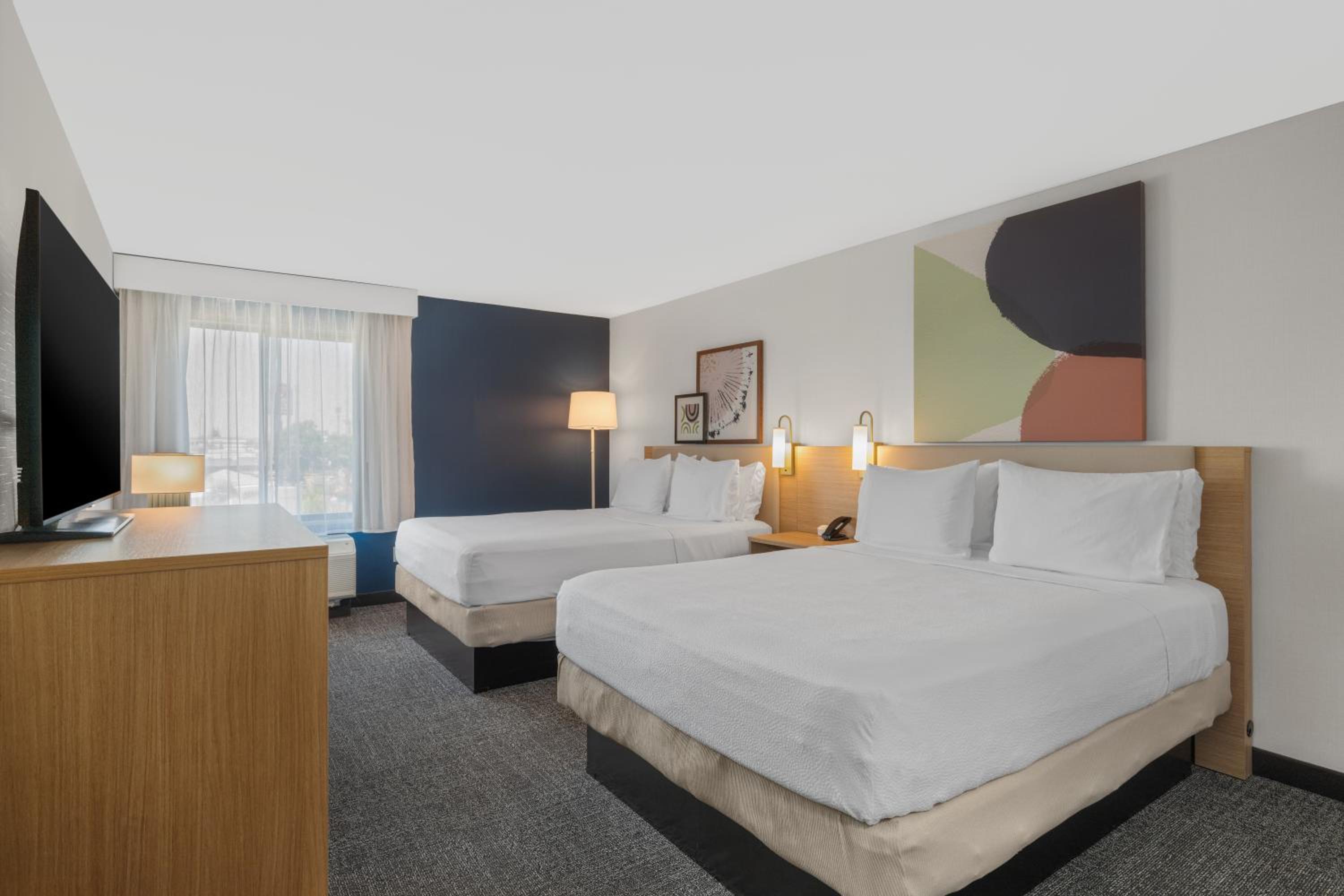 Queen Room with Two Queen Beds - Photo 1