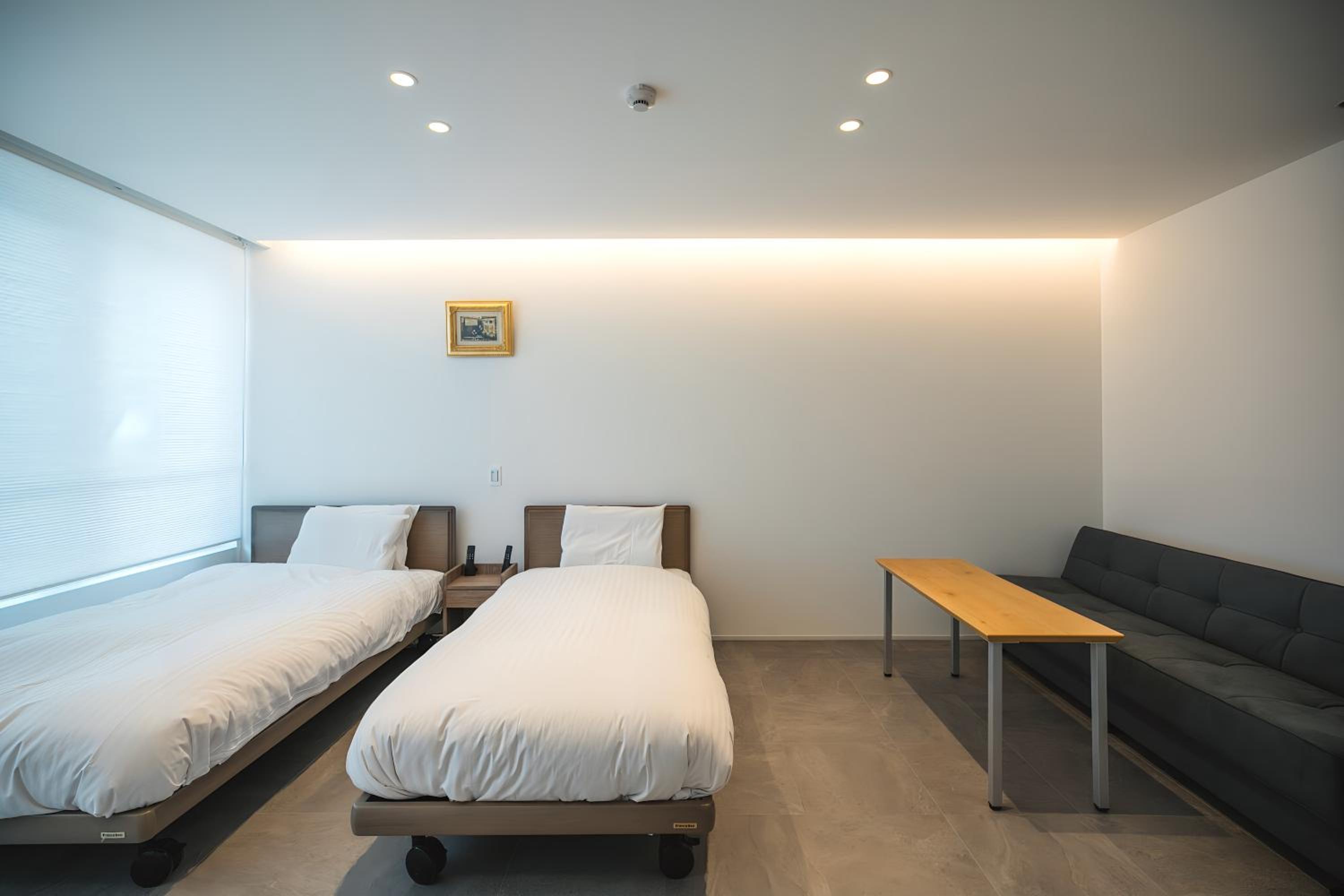 Twin Room with Private Bathroom - Photo 1