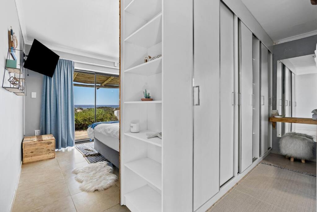 Three-Bedroom House - Photo 25