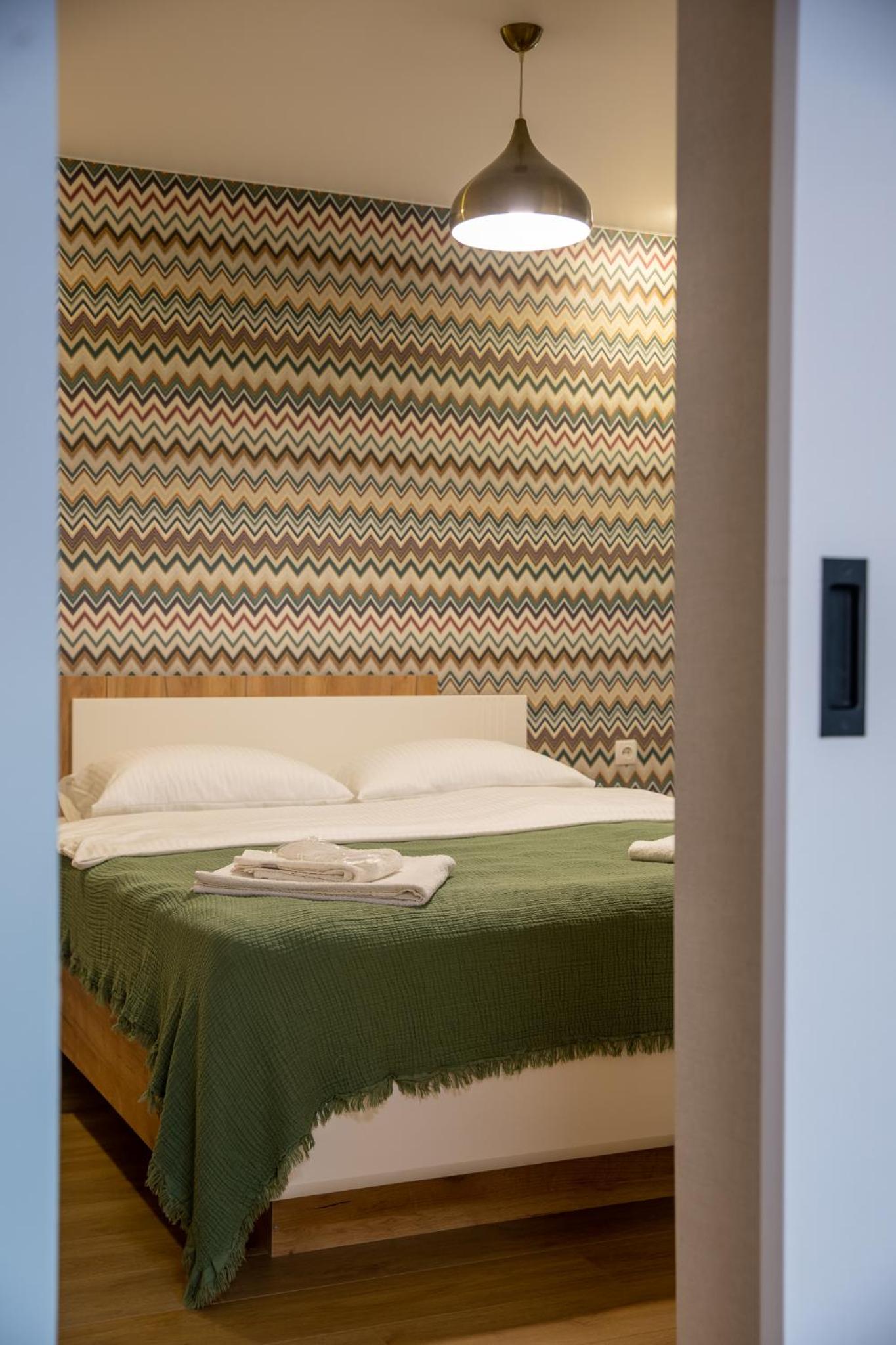 Deluxe One-Bedroom Apartment with City View