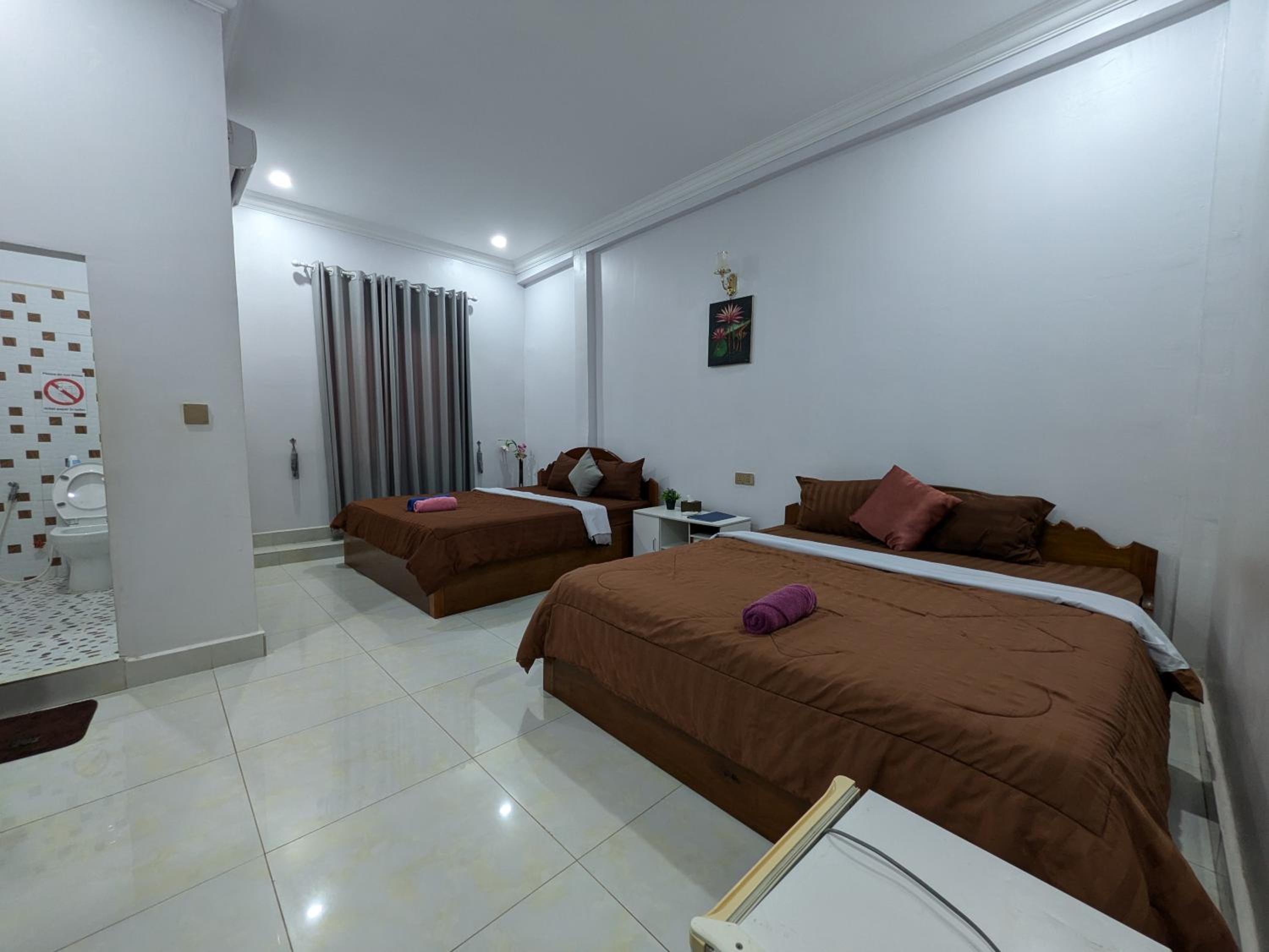 Quadruple Room with Private Bathroom