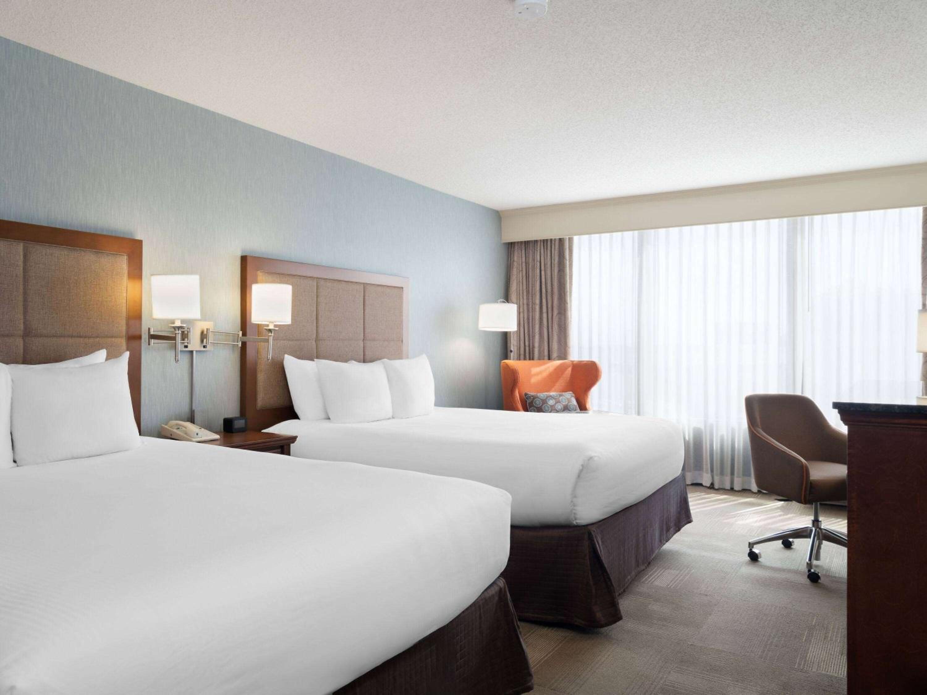 Queen Room with Two Queen Beds, Mobility Access and Bathtub with Grab Bars, Non-Smoking photo 1