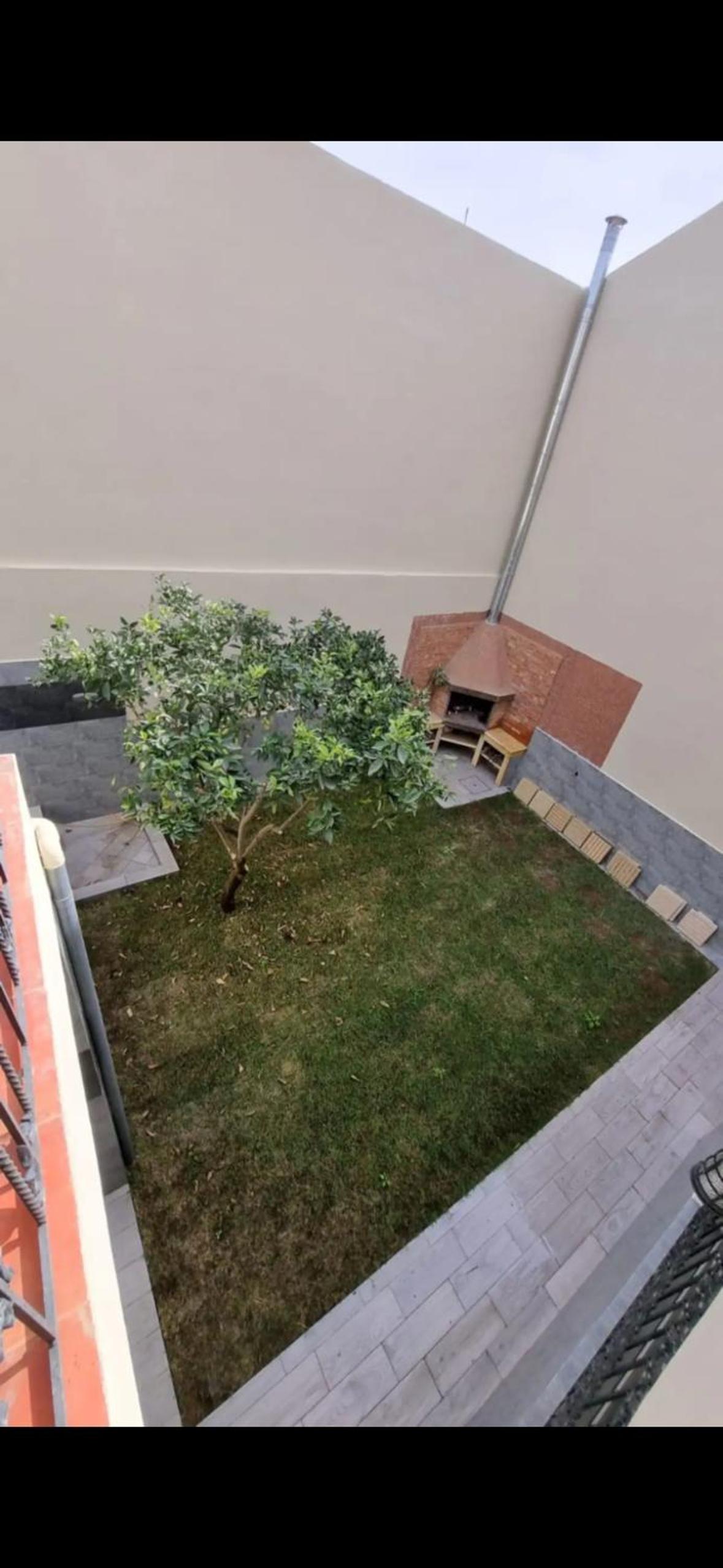 Three-Bedroom House photo 3