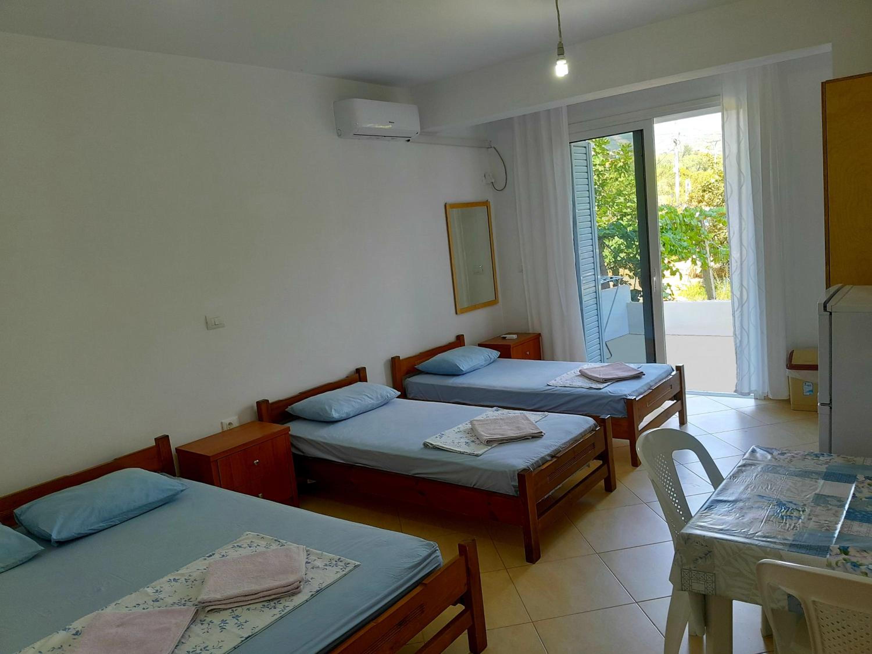 Quadruple Room with Balcony and Garden View