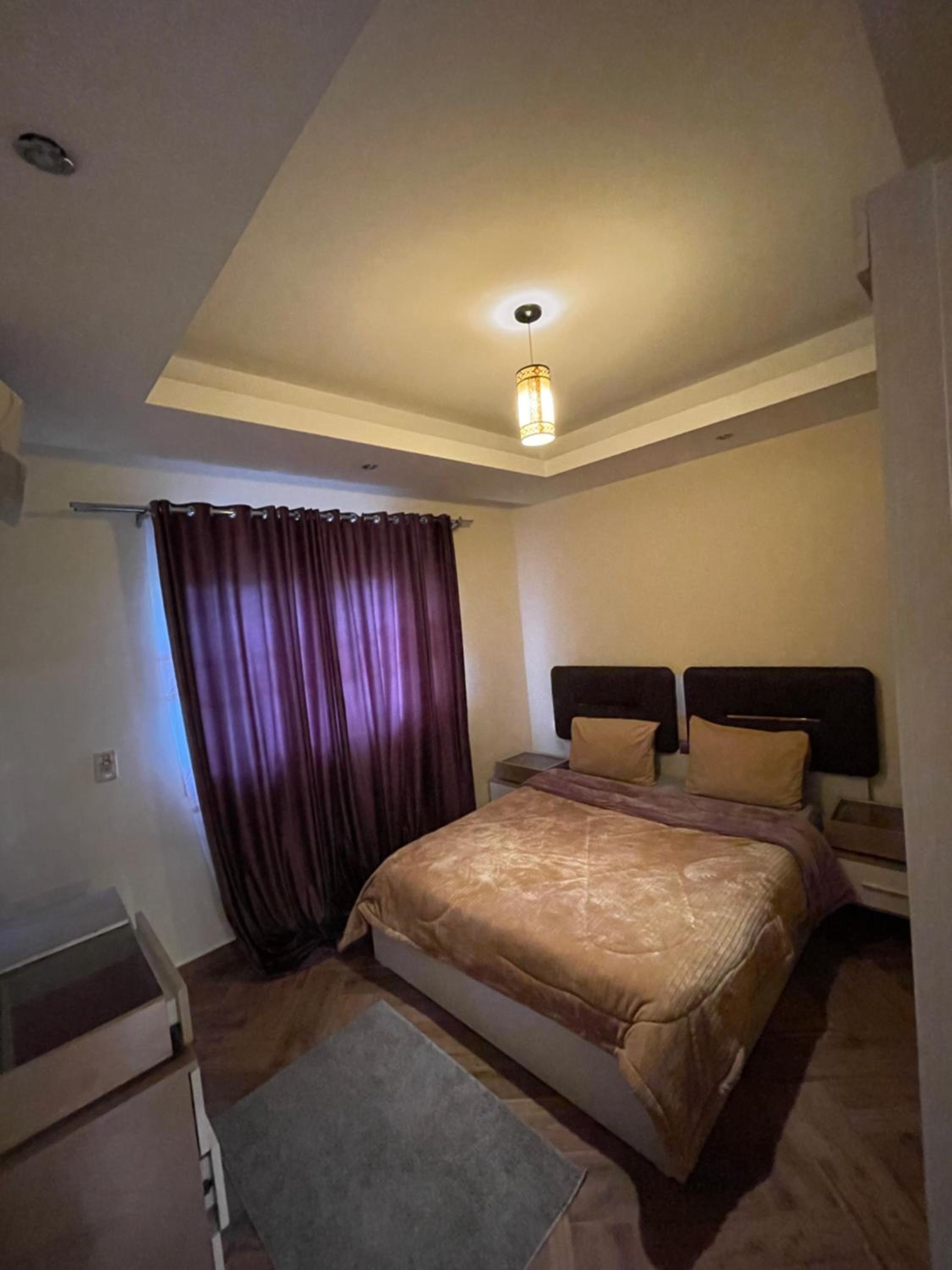 Three-Bedroom Apartment photo 1