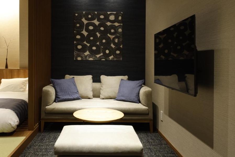 Deluxe Family Suite - Photo 7