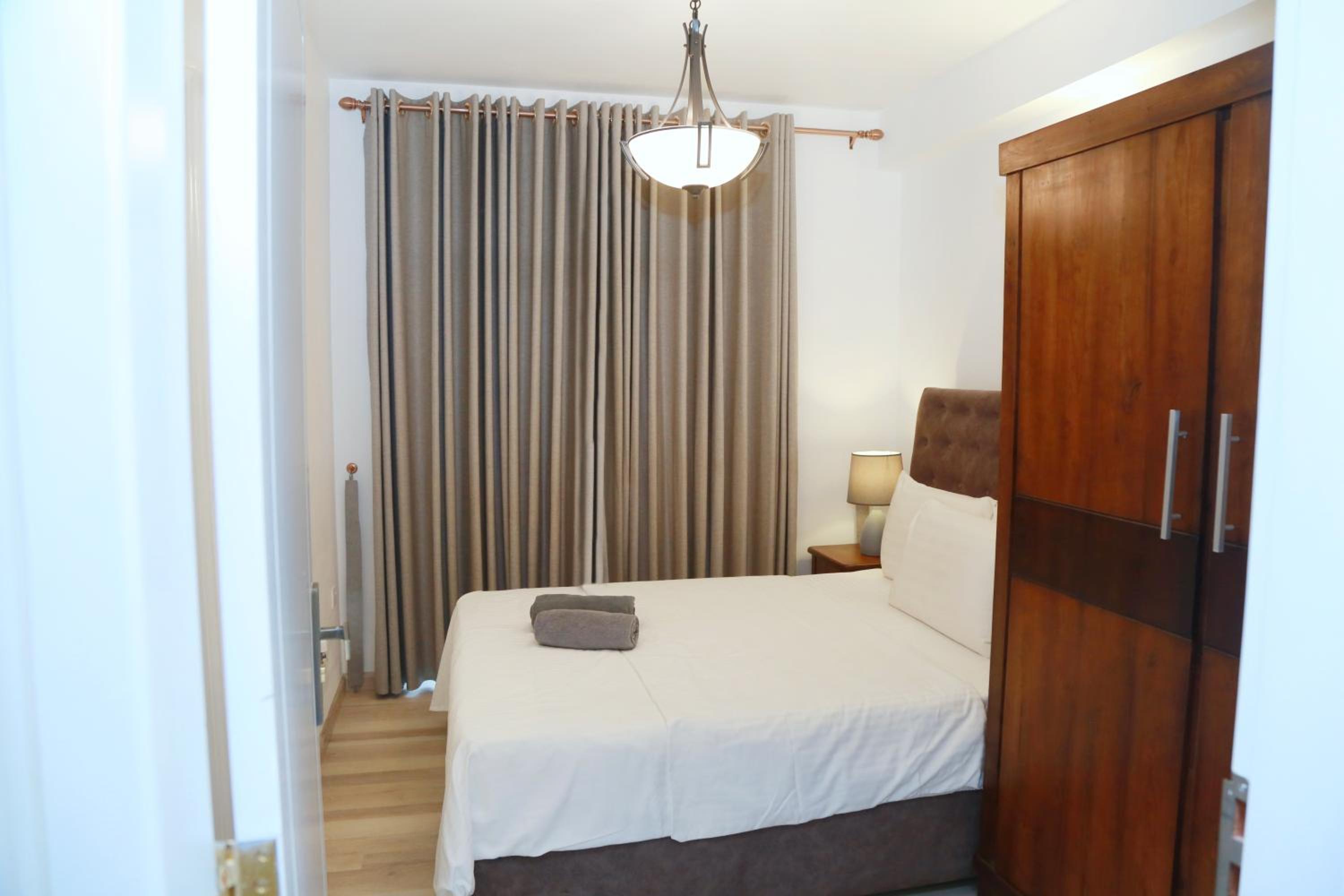 Three-Bedroom Apartment photo 1