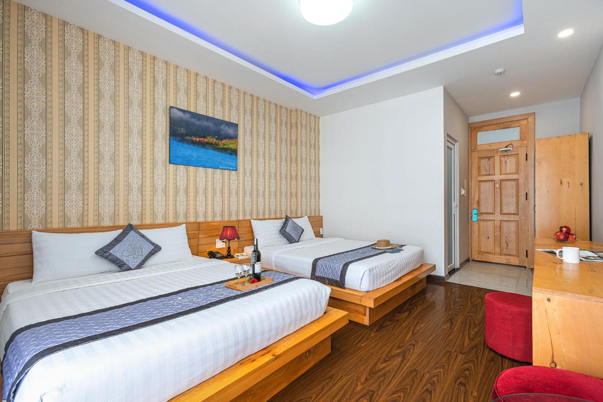Deluxe Queen Room with Two Queen Beds photo 2