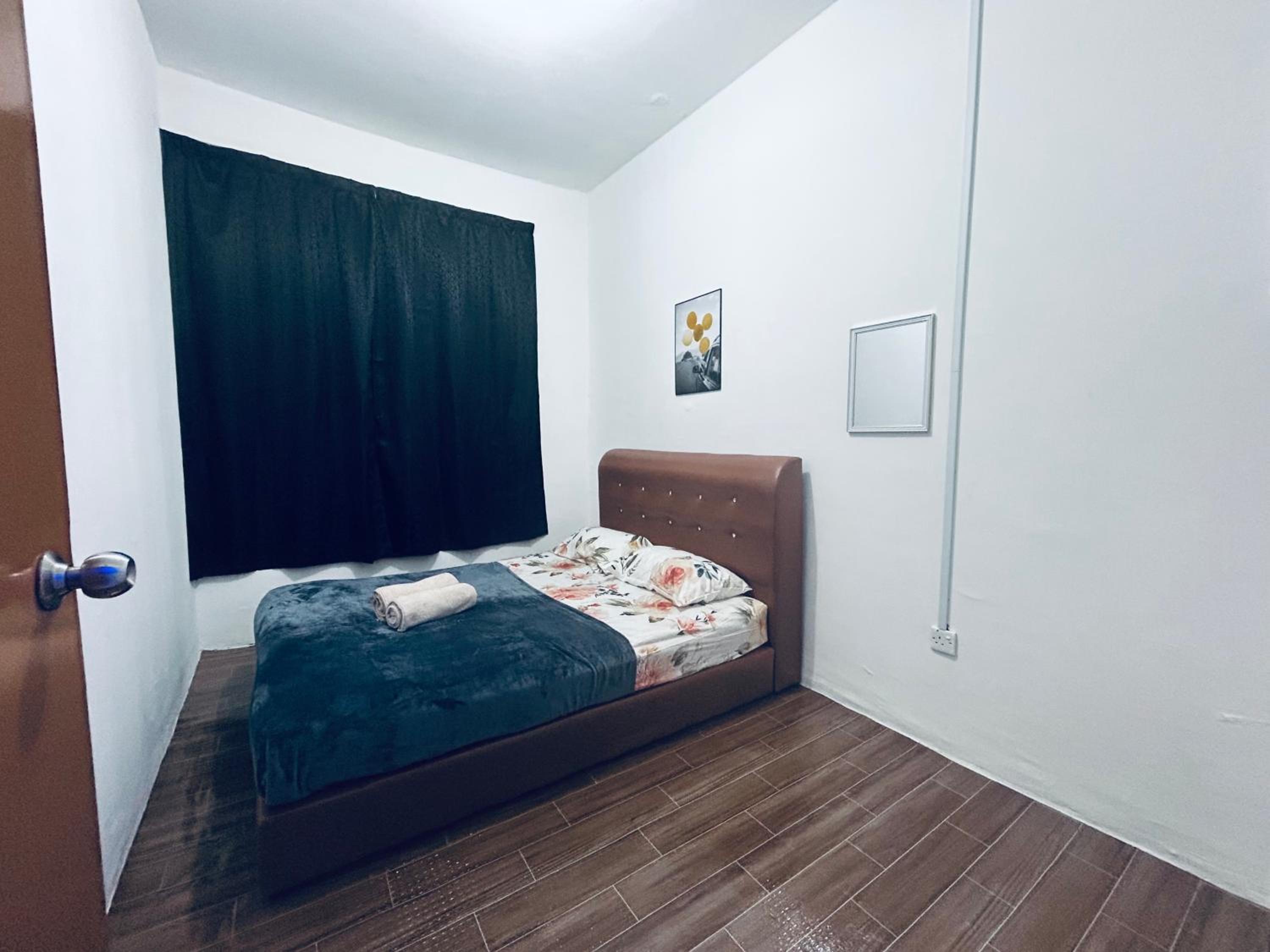 Three-Bedroom Apartment photo 2
