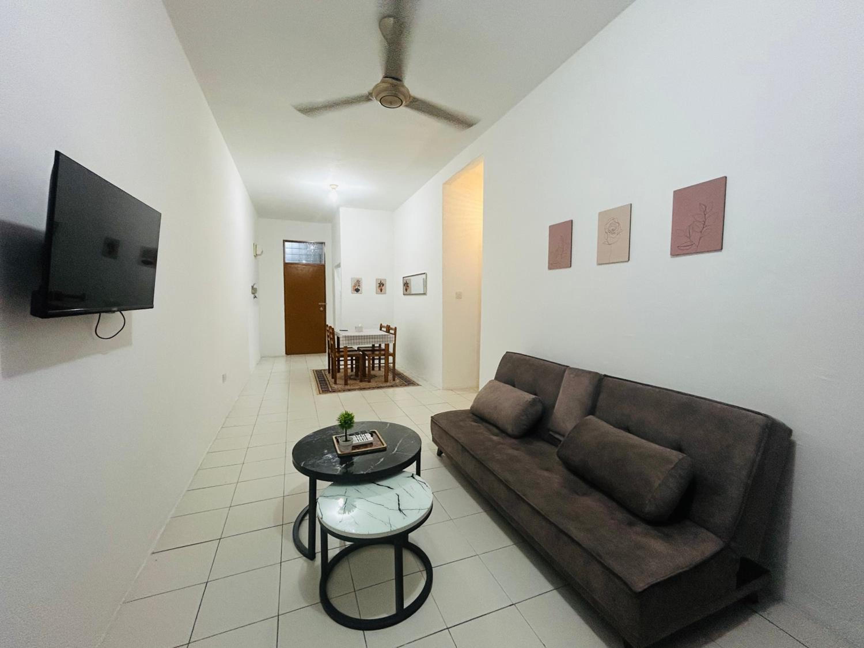 Three-Bedroom Apartment photo 1