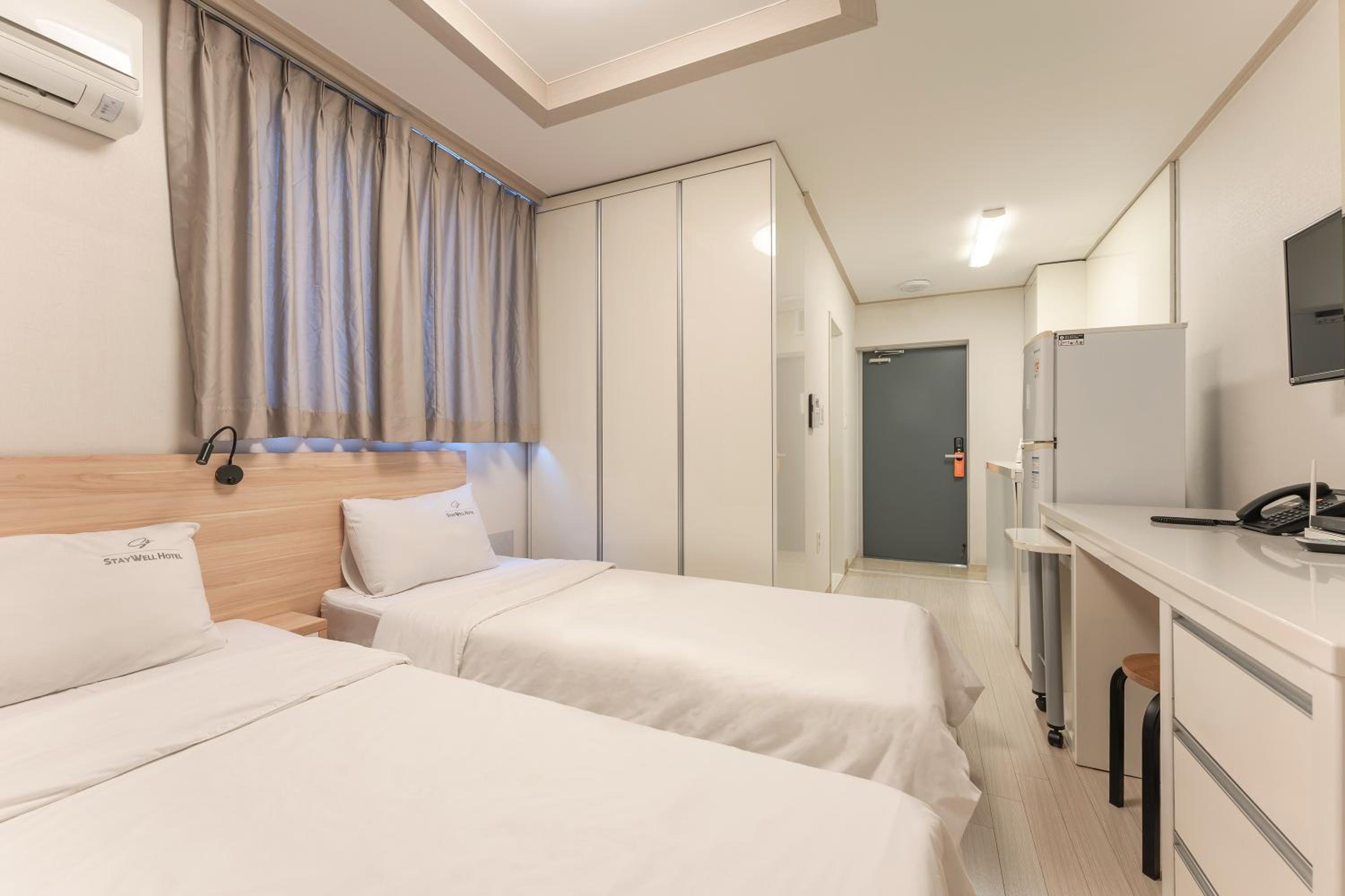 Standard Twin Room - Photo 16