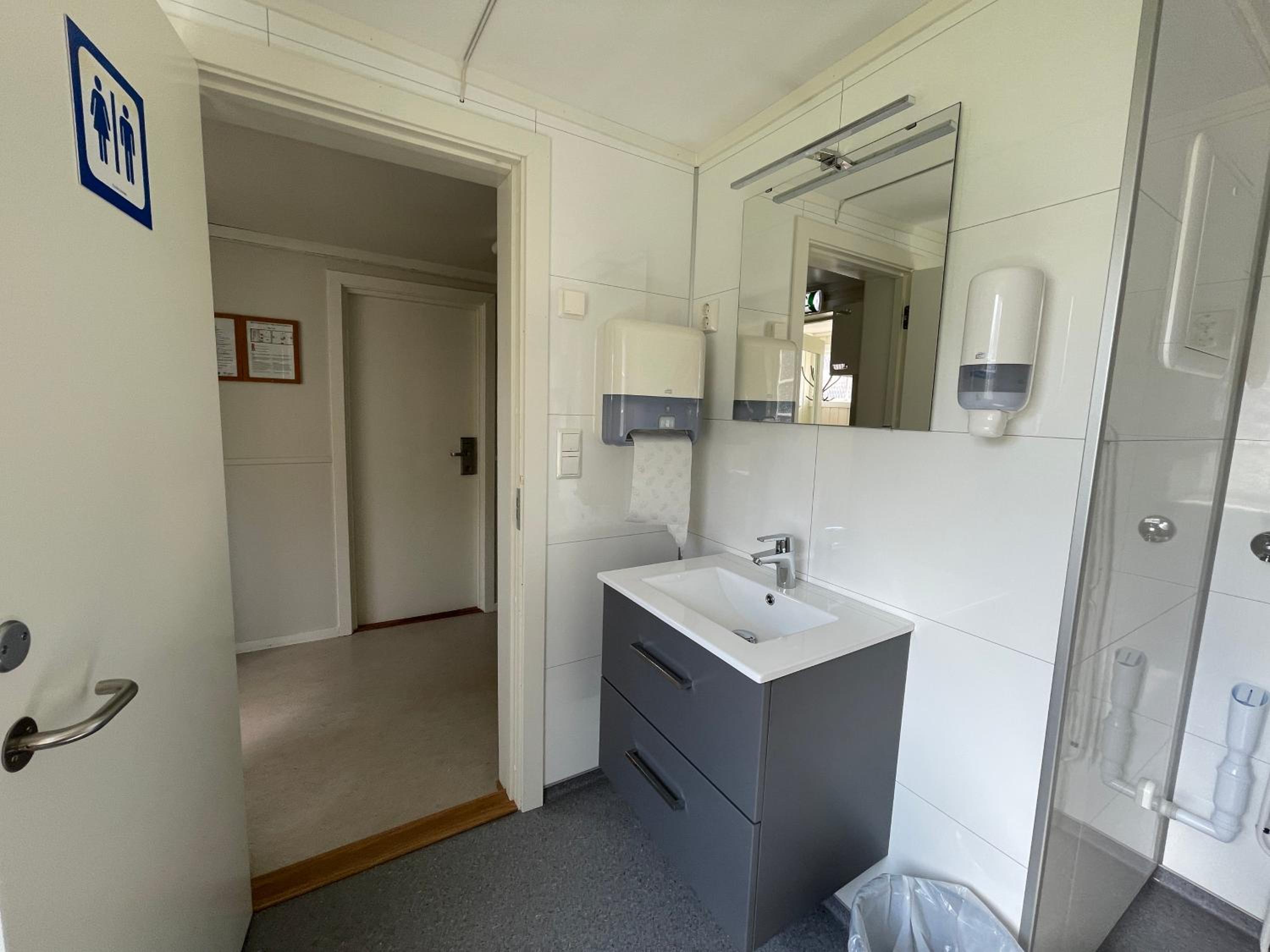 Three-Bedroom House - Photo 17
