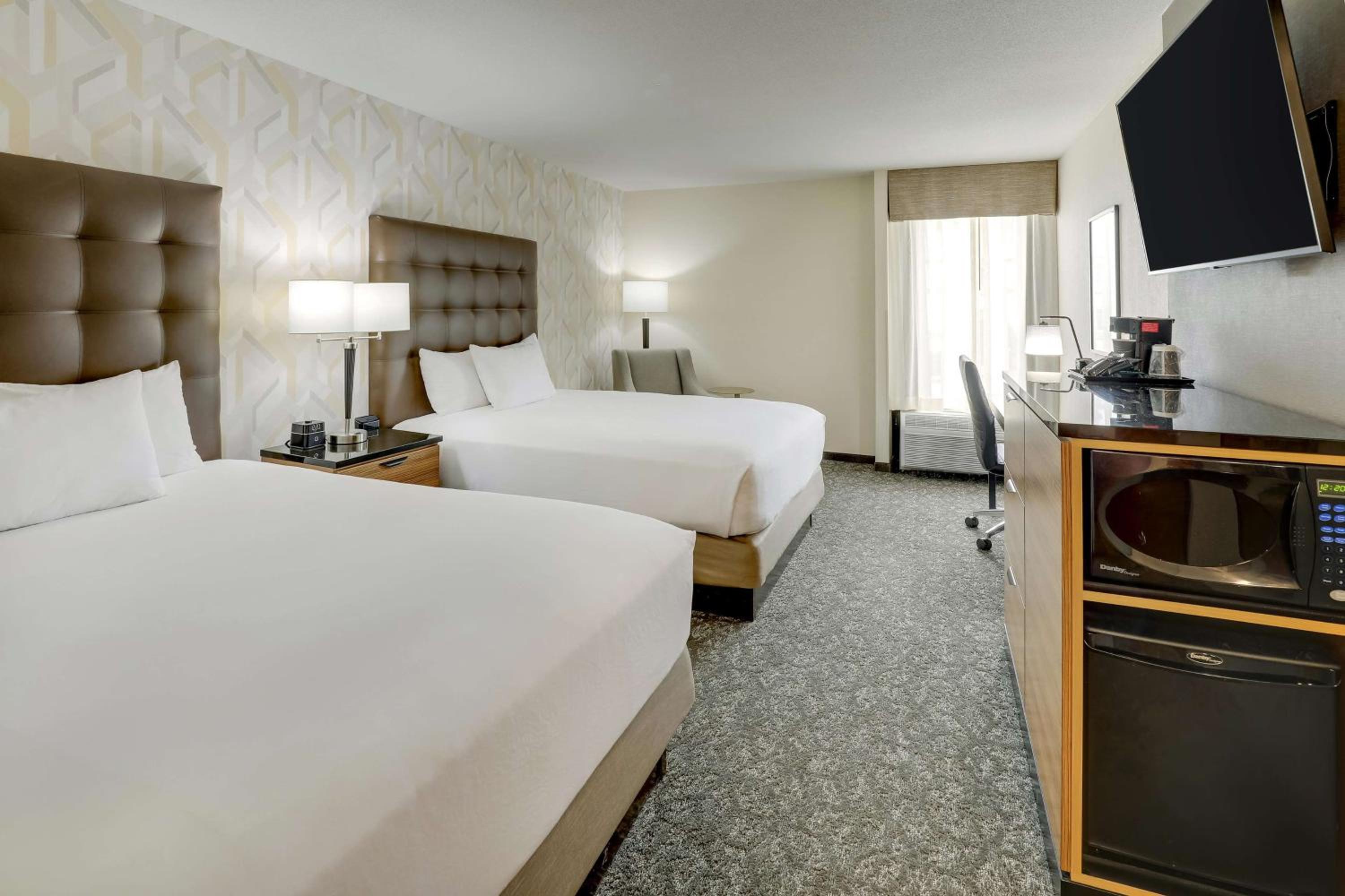 Deluxe Queen Room with Two Queen Beds - Photo 1