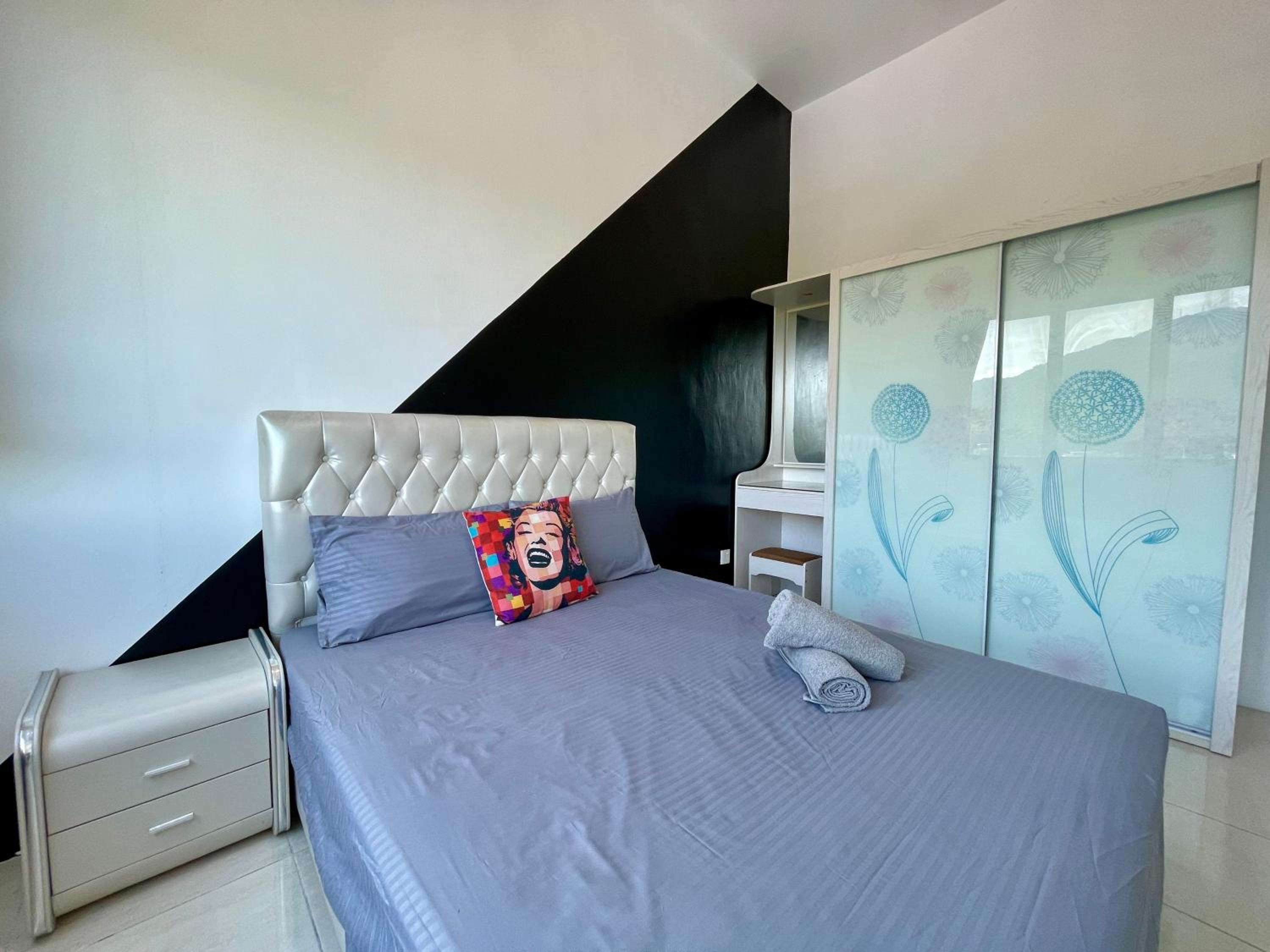 Three-Bedroom Apartment - Photo 12