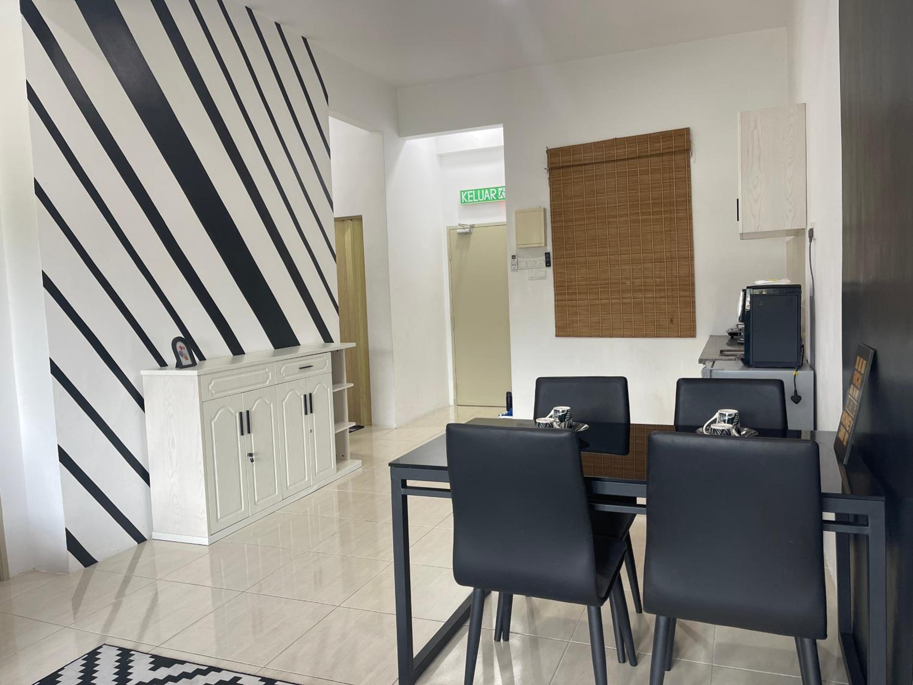 Three-Bedroom Apartment - Photo 14