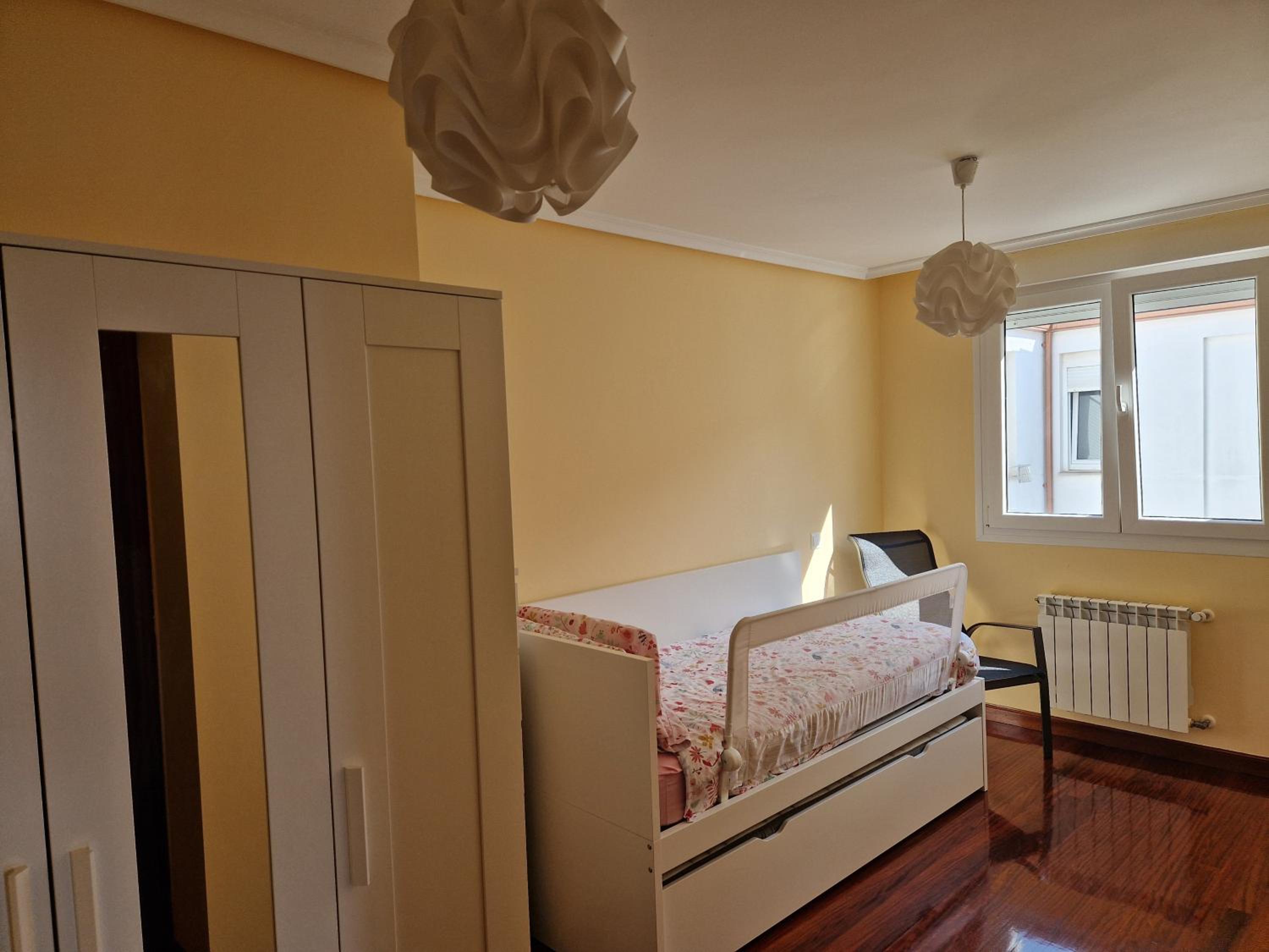 Three-Bedroom Apartment photo 2