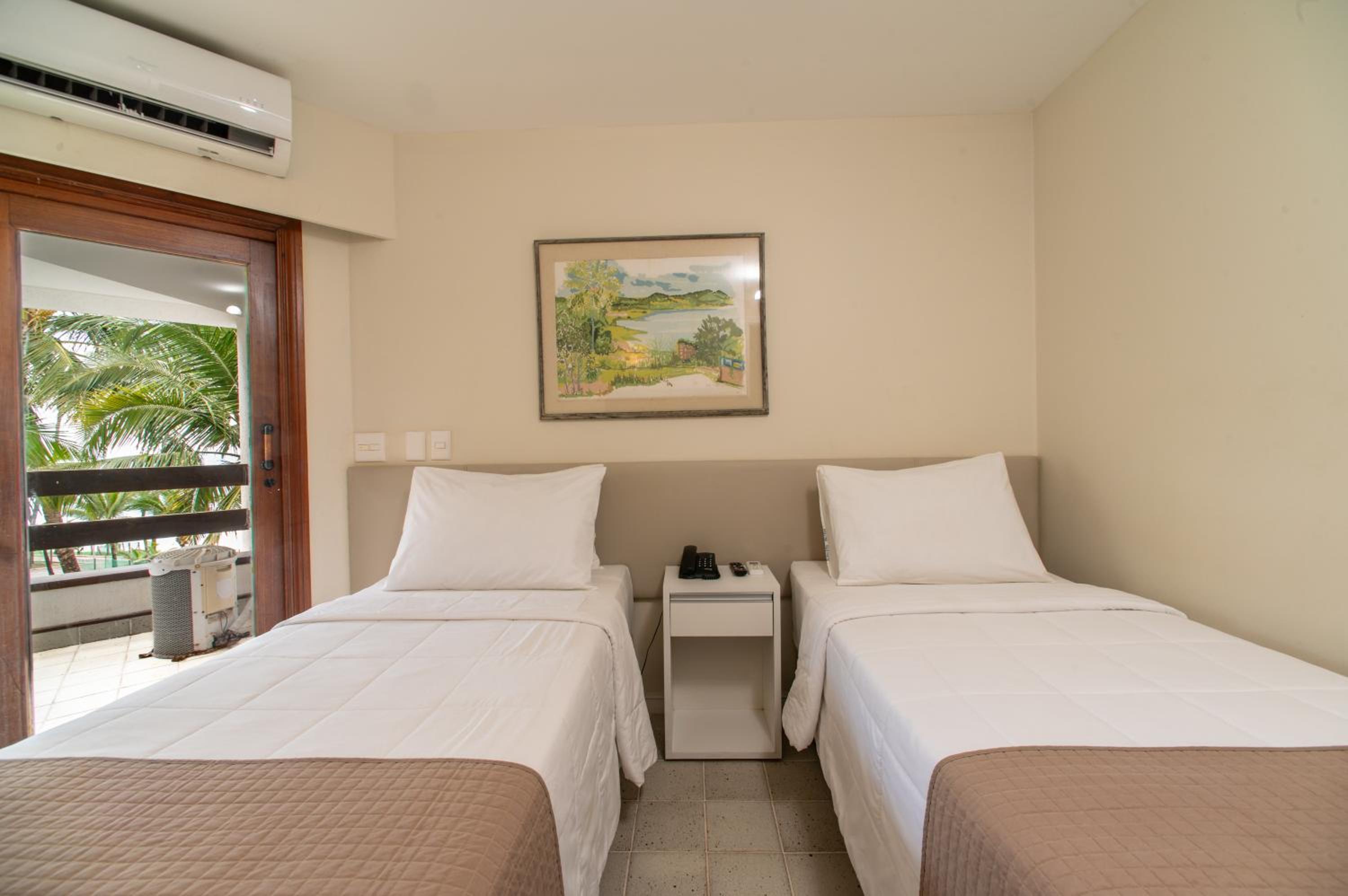Twin Apartment with Balcony and Sea View with living room