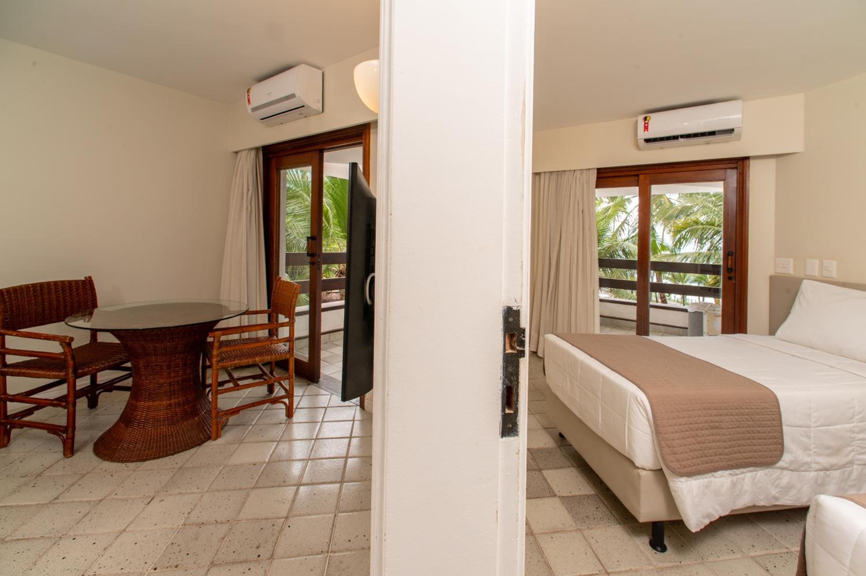 Twin Apartment with Balcony and Sea View with living room