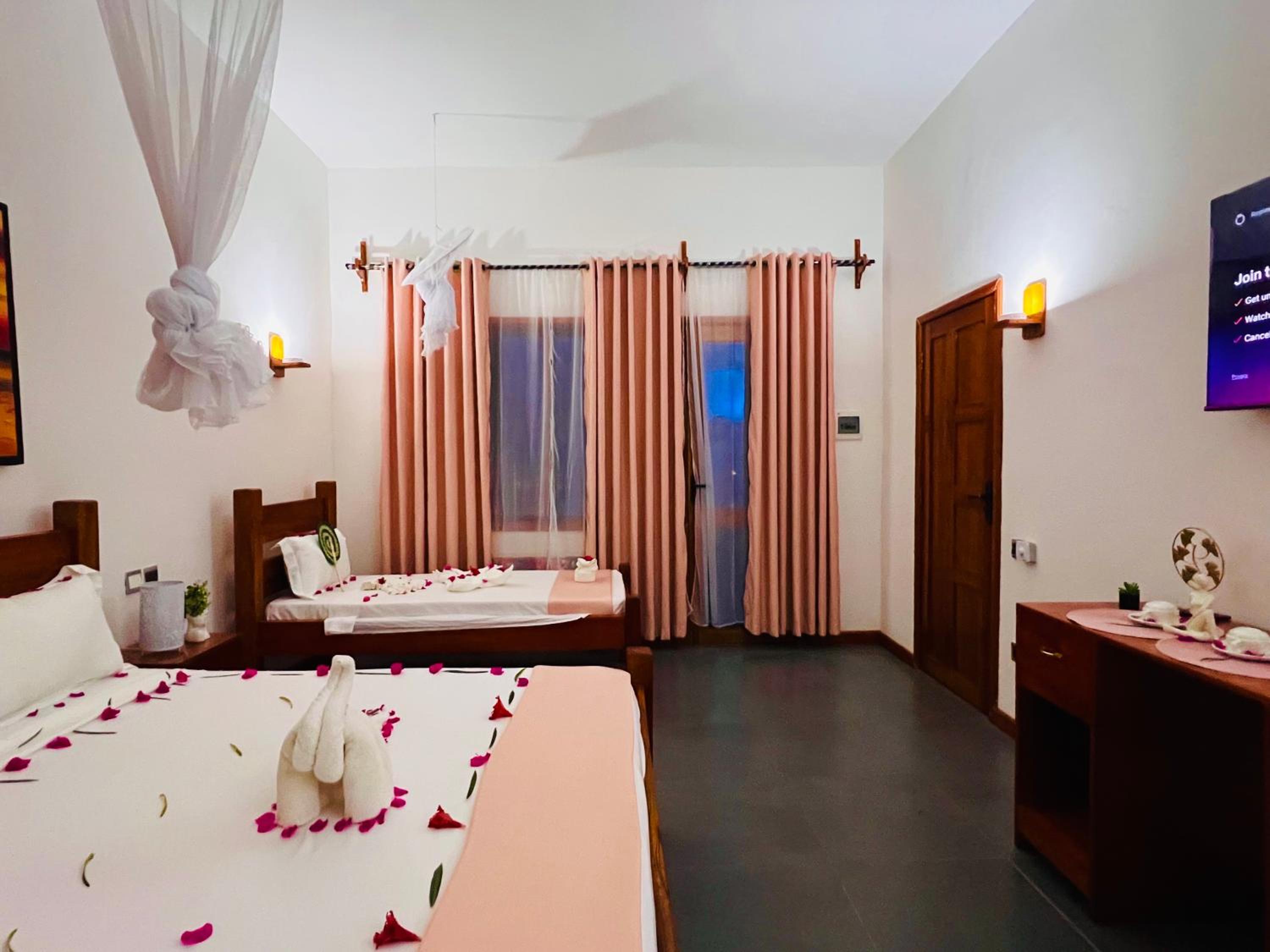 Deluxe Triple Room