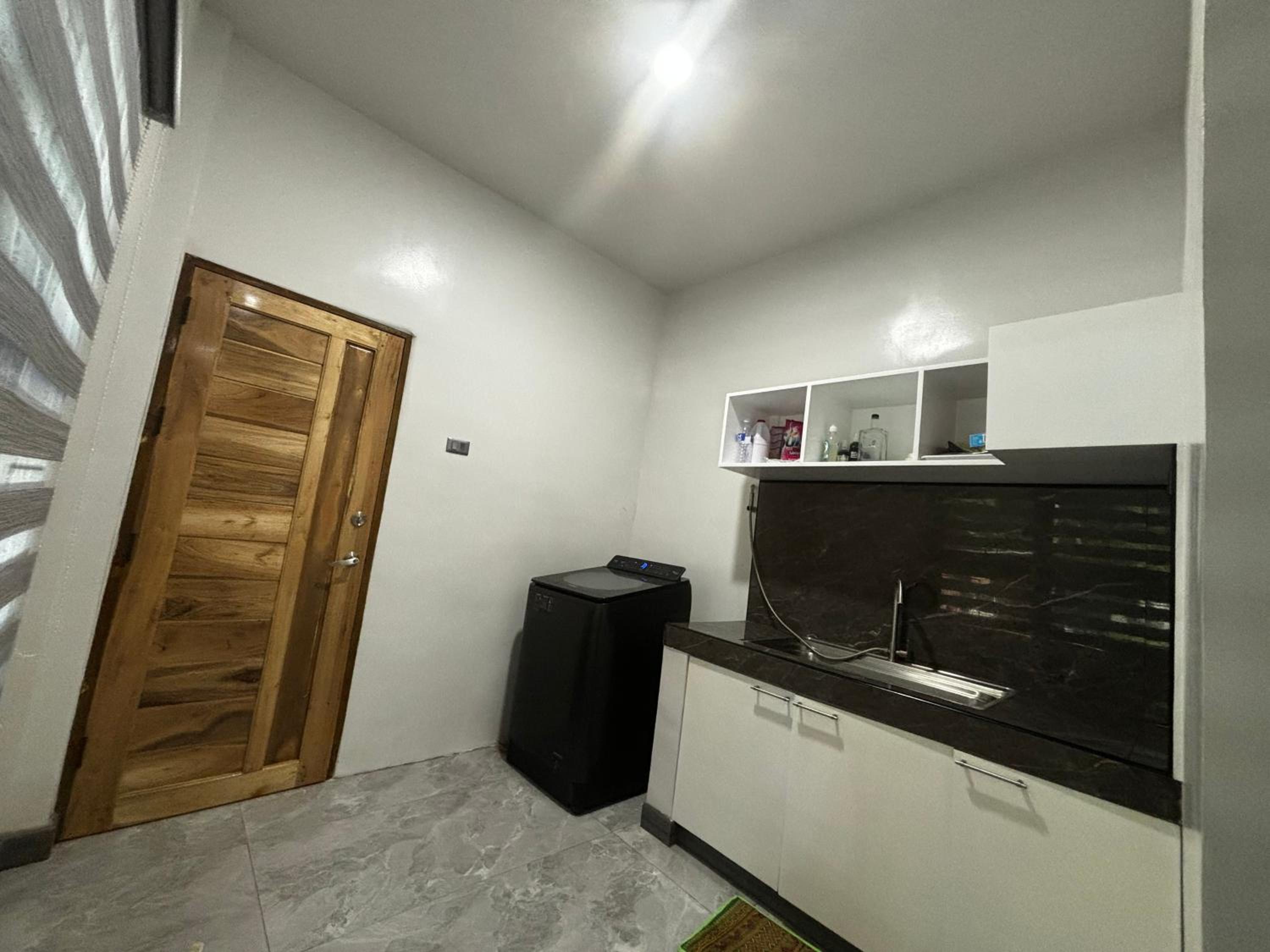 Three-Bedroom House photo 2