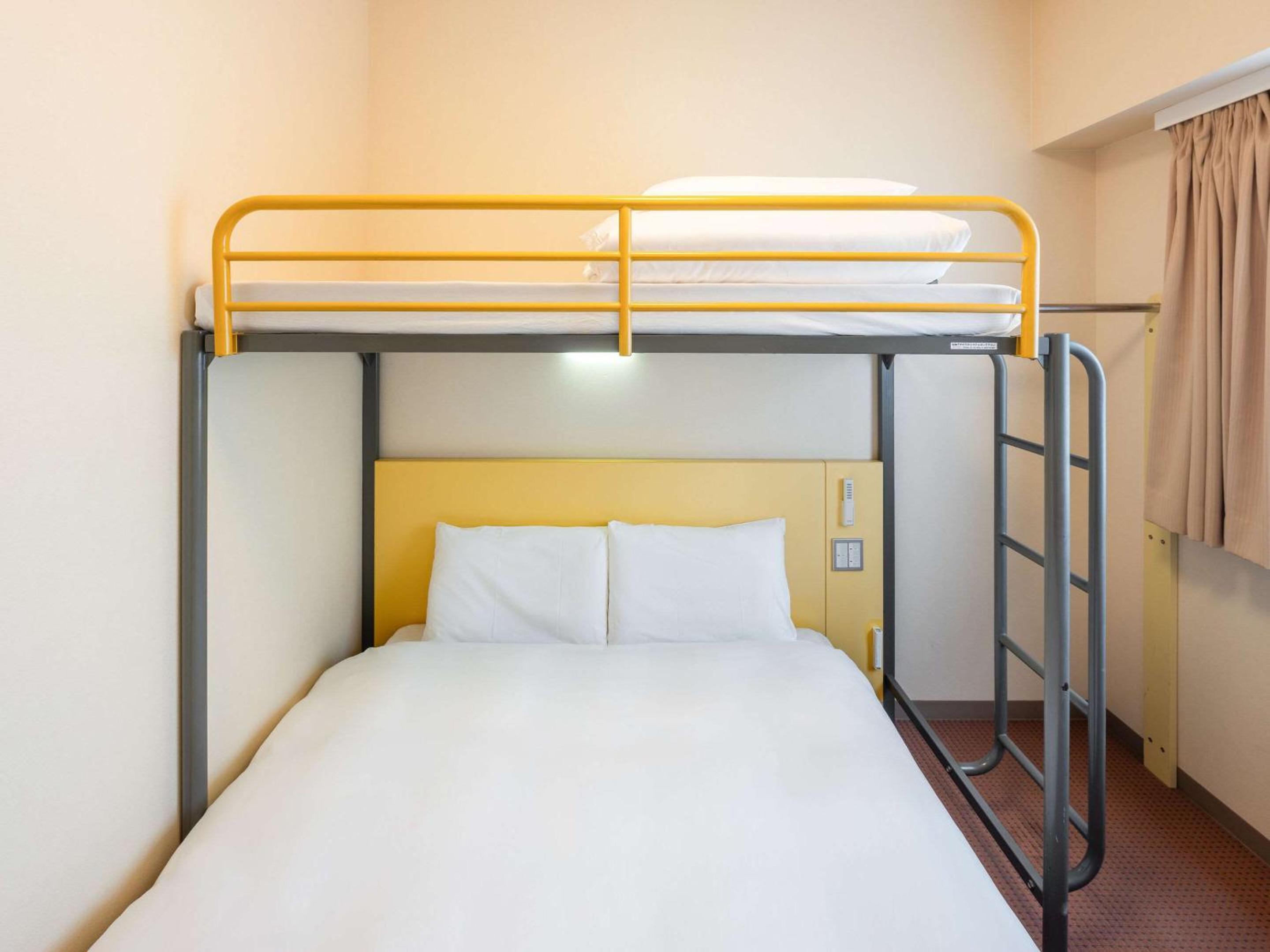 Queen Room with a Loft Bed - Non Smoking - Photo 1