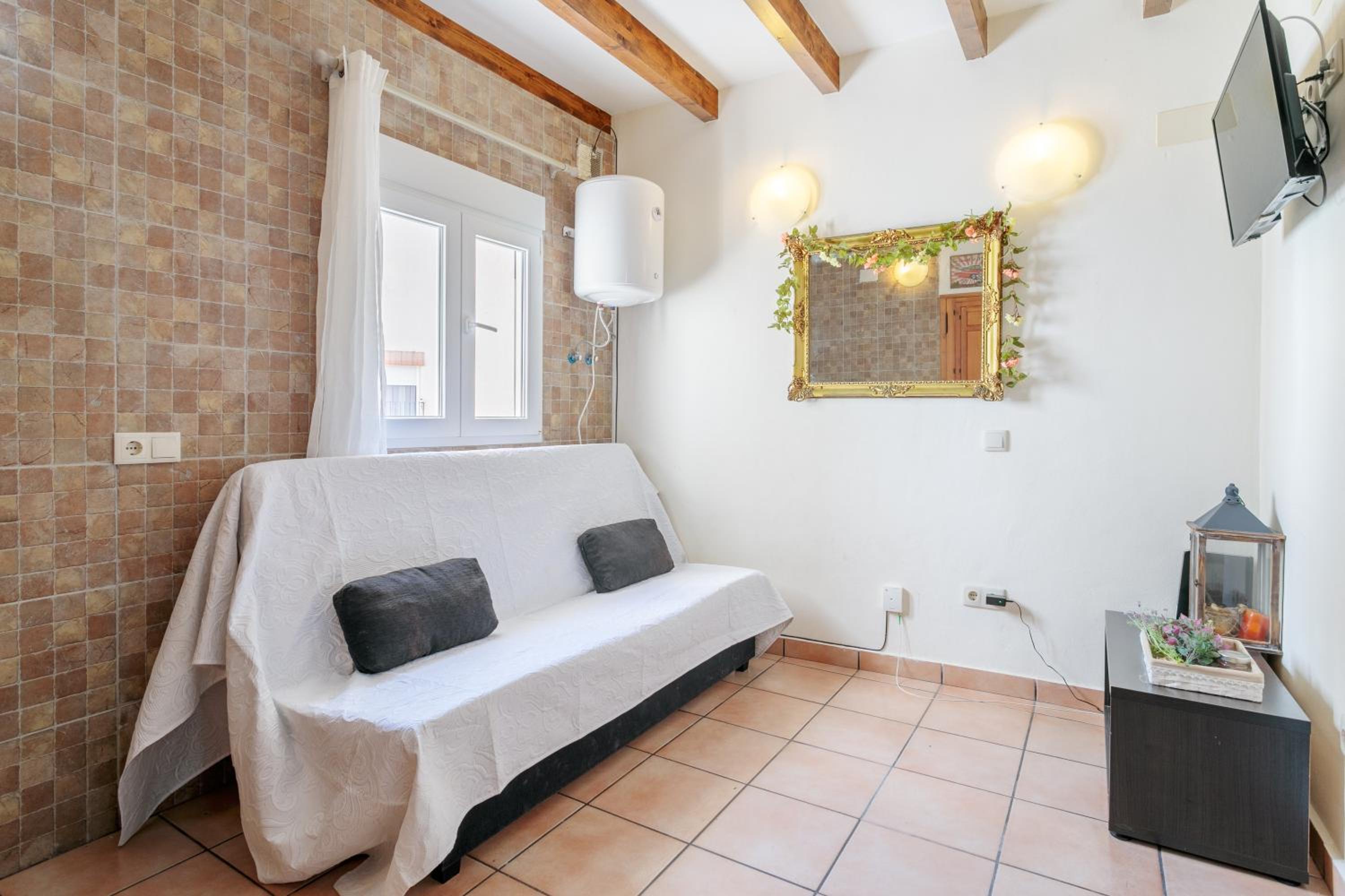 Apartamento de un dormitorio superior con balcón