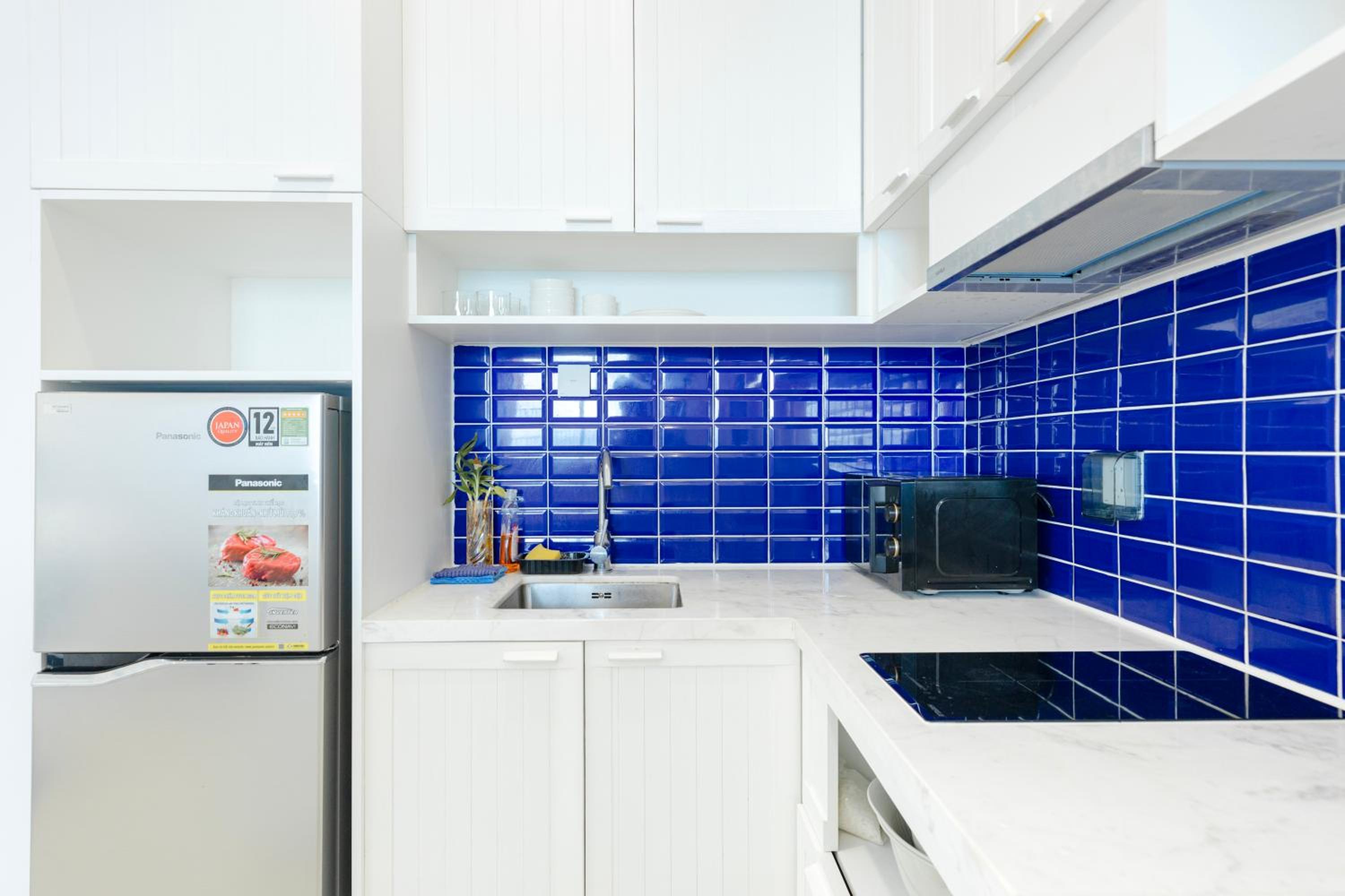 Three-Bedroom Apartment with Ocean View - Photo 39