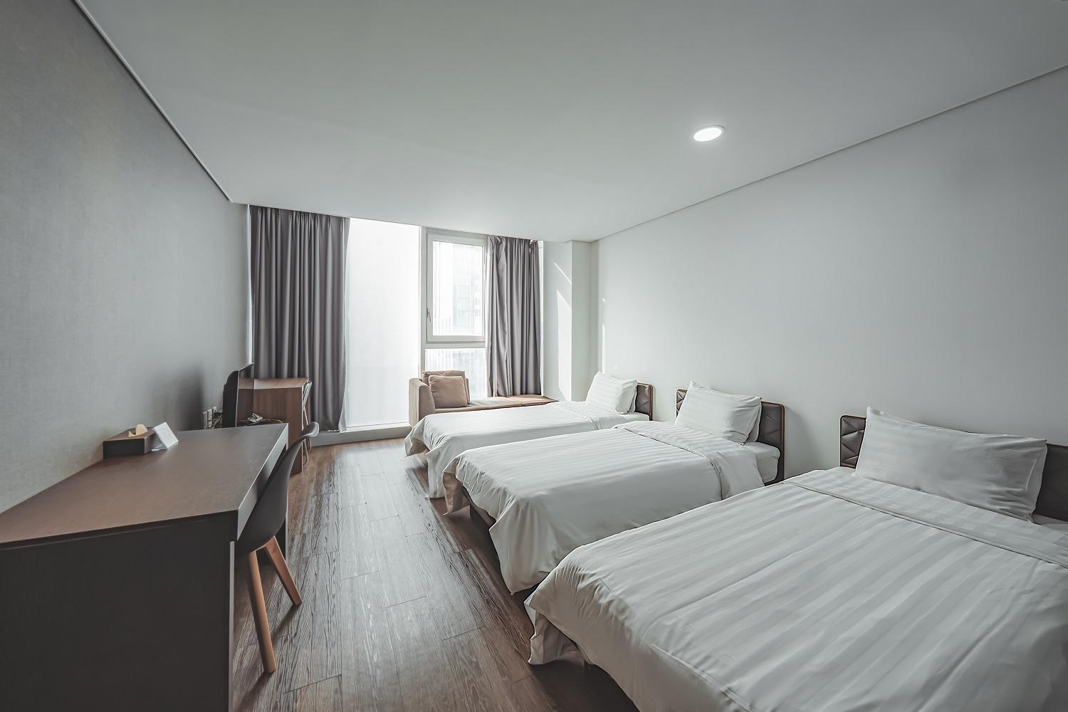 Deluxe Triple Room - Photo 1
