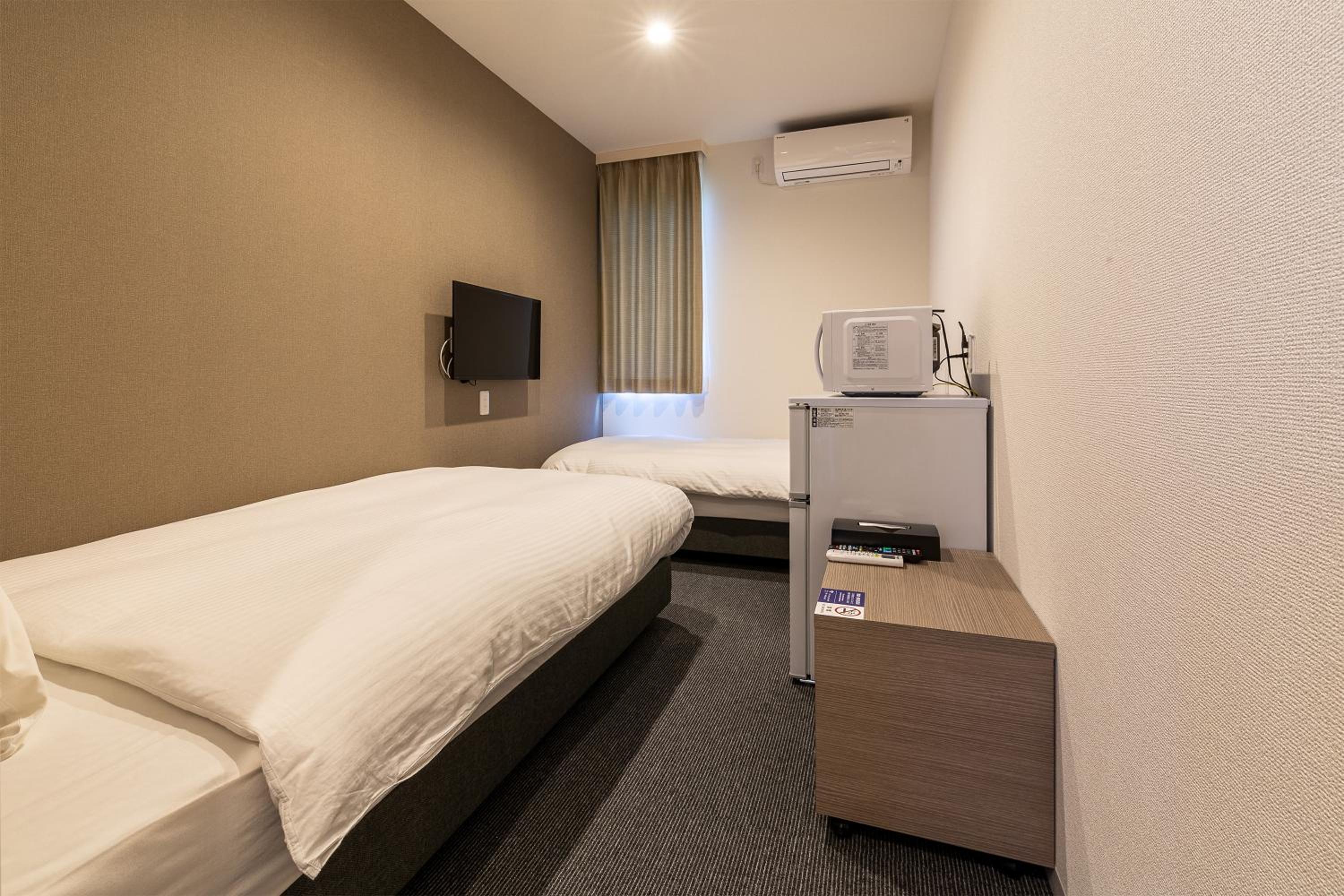 Standard Twin Room - Photo 1