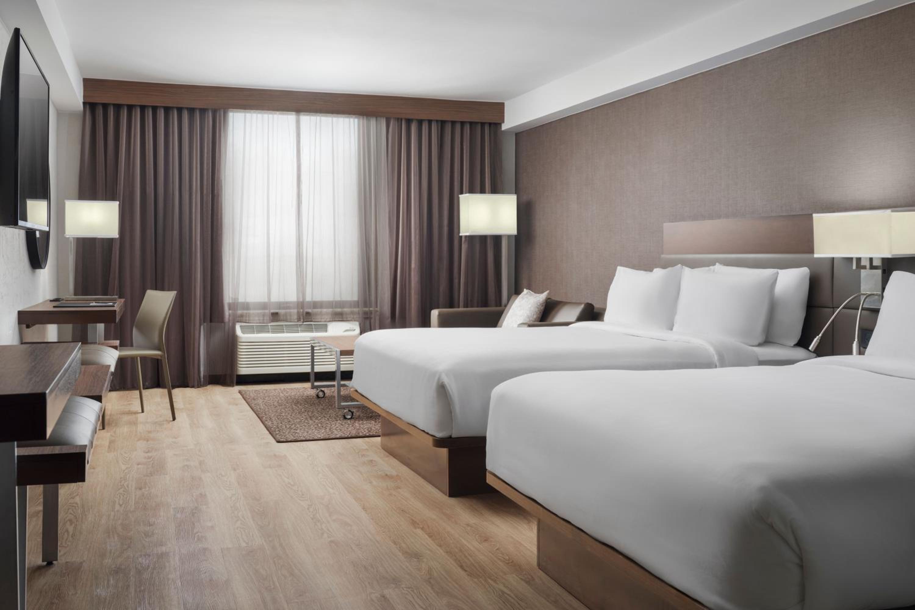 Queen Room with Two Queen Beds and Sofa Bed