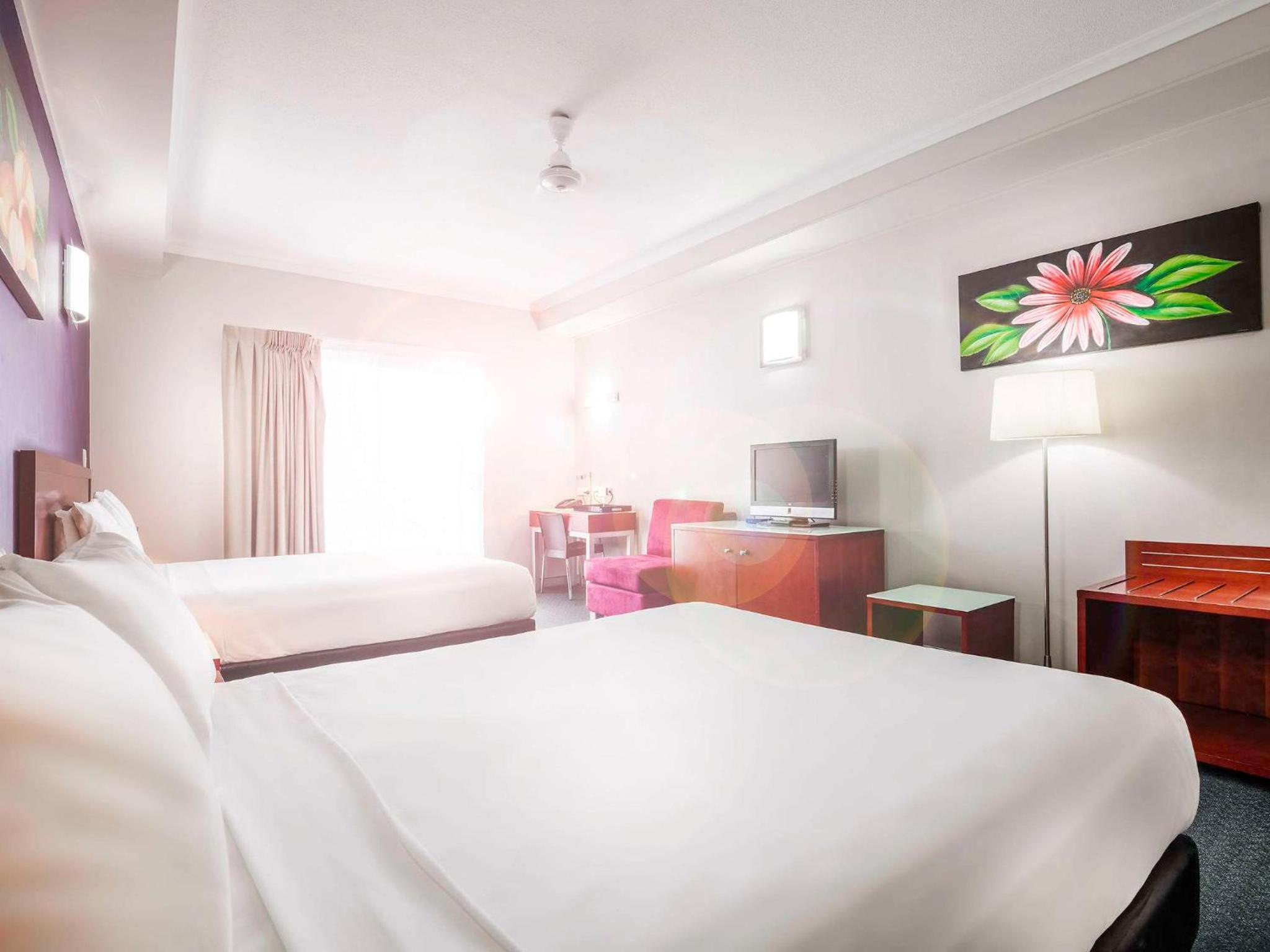 Room with Twin and Queen Beds and Pool View - Photo 8