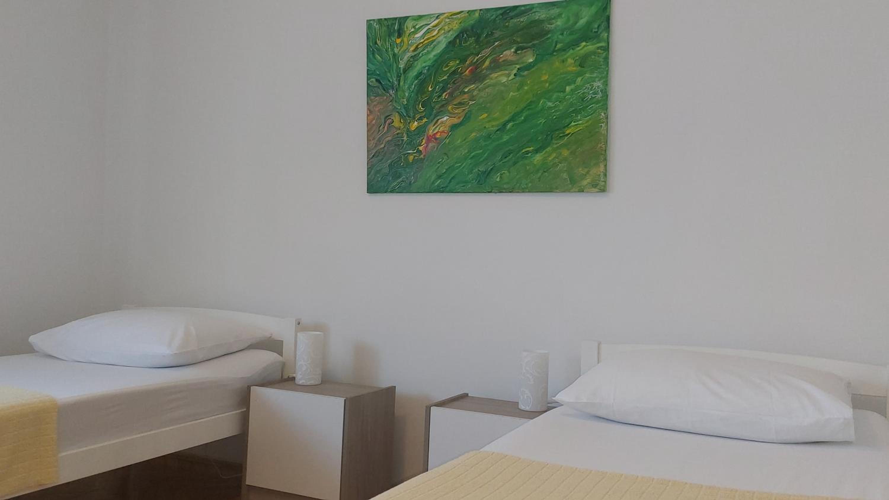 Three-Bedroom Apartment - Photo 12