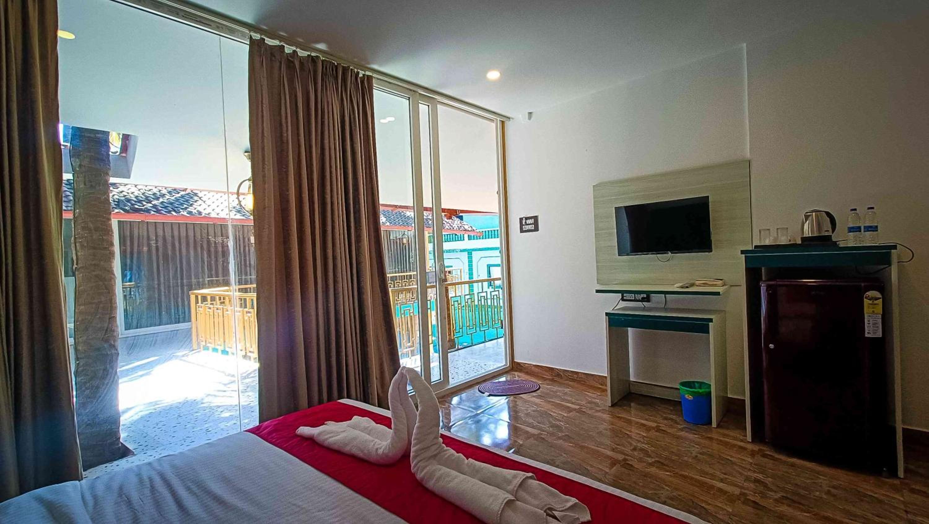 Deluxe Room - Photo 1
