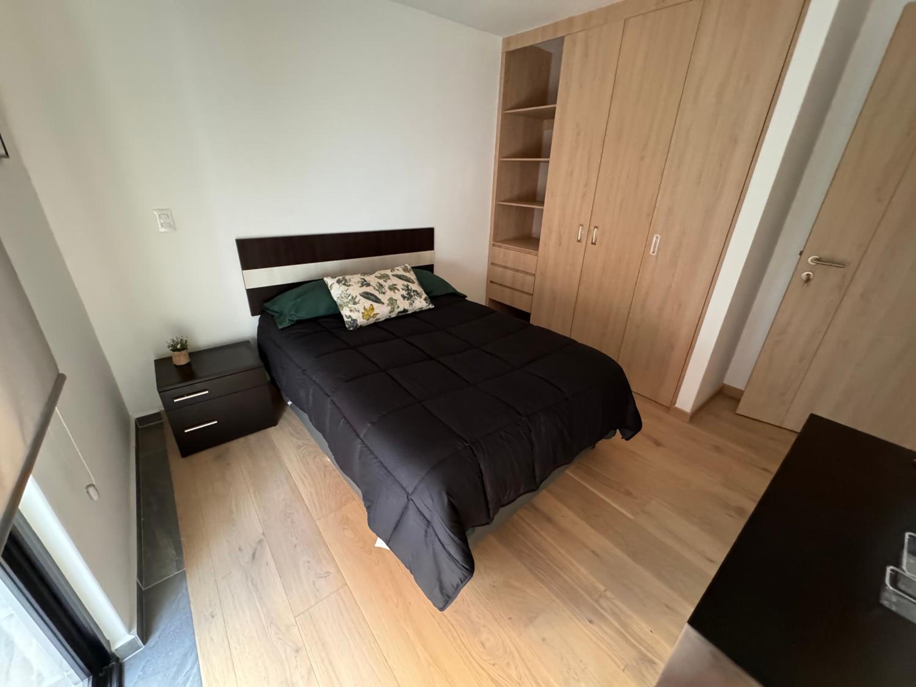 Three-Bedroom Apartment photo 1