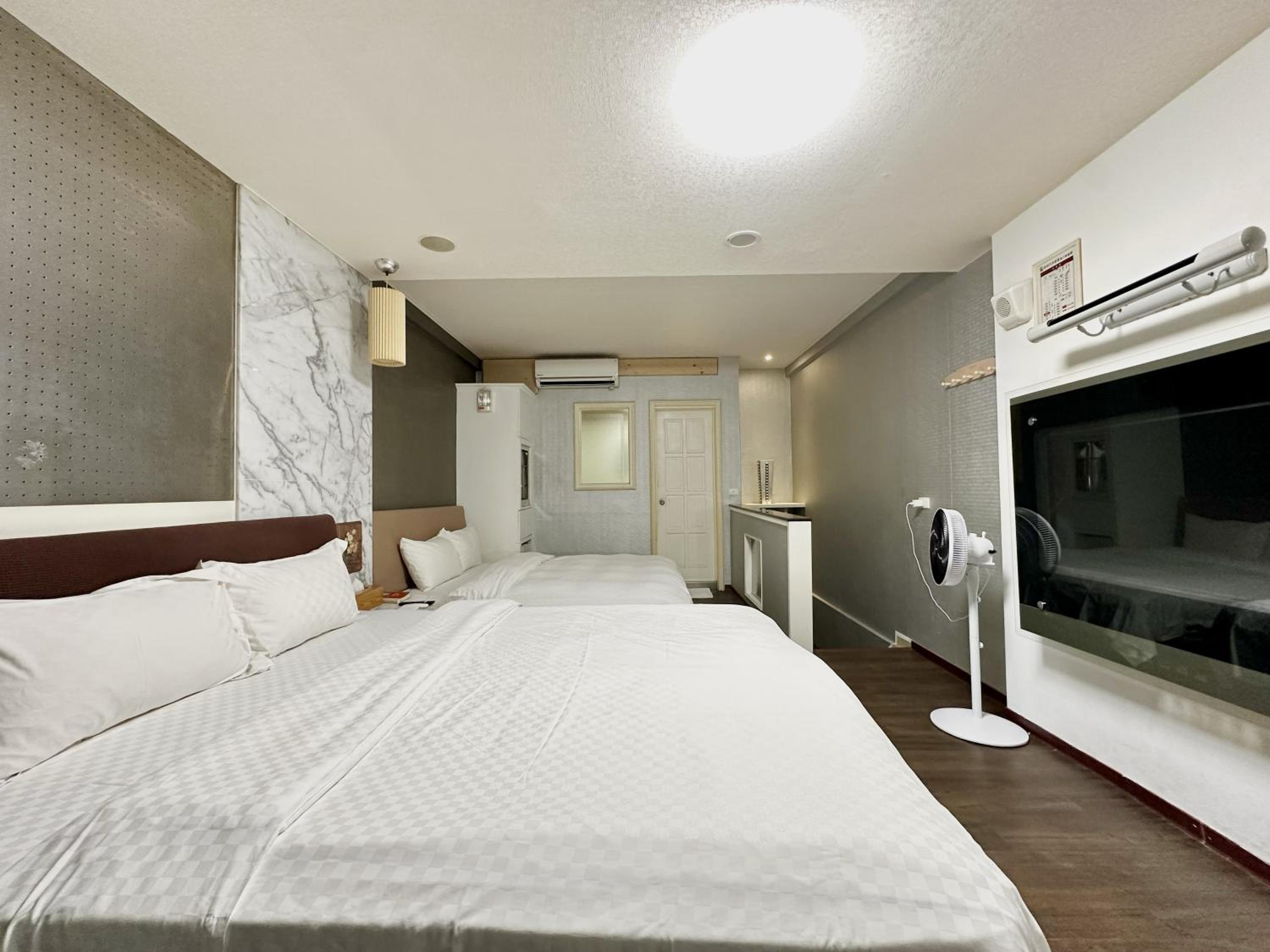 Quadruple Room with Private Bathroom