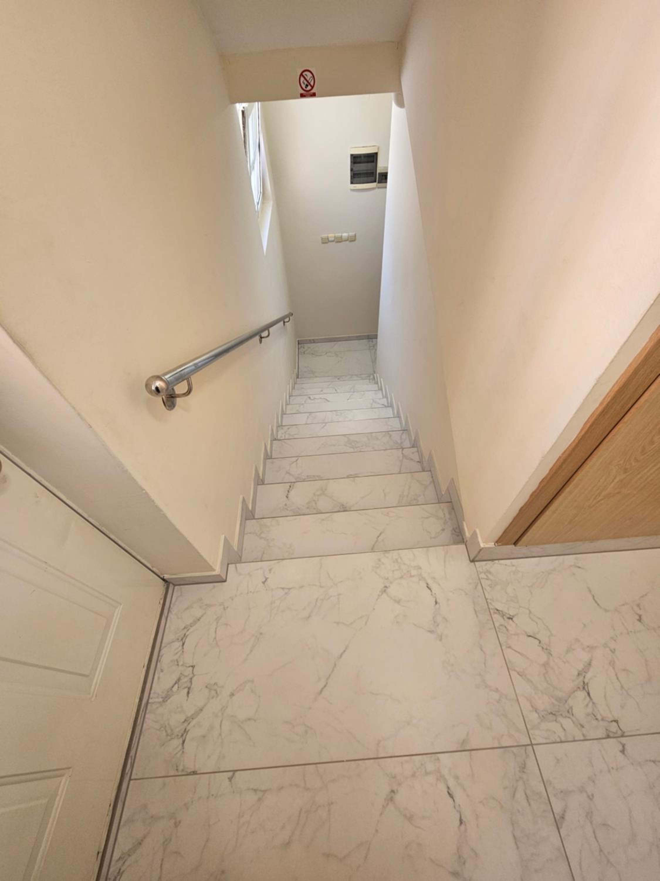 Three-Bedroom Apartment - Photo 10