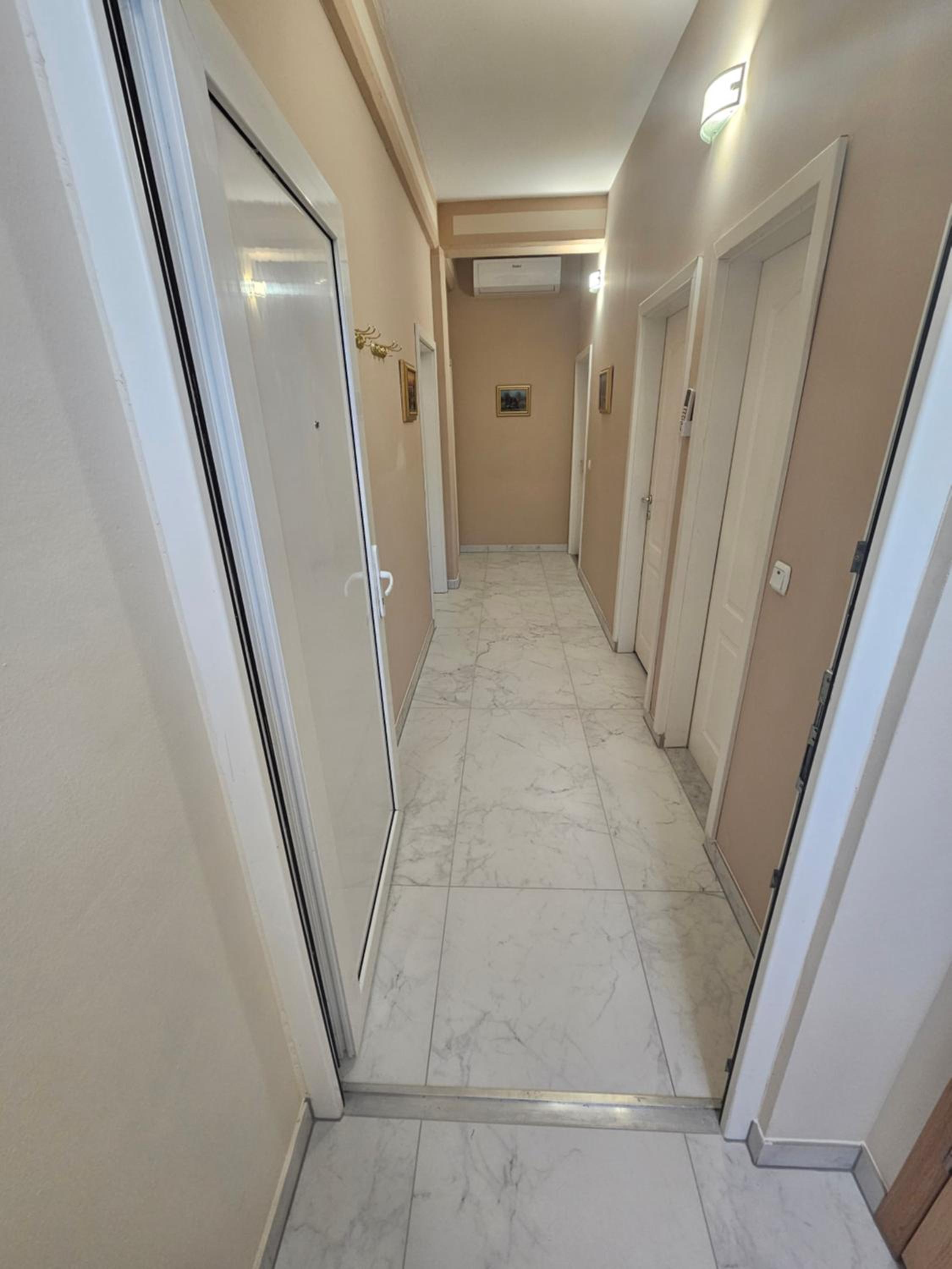 Three-Bedroom Apartment - Photo 8