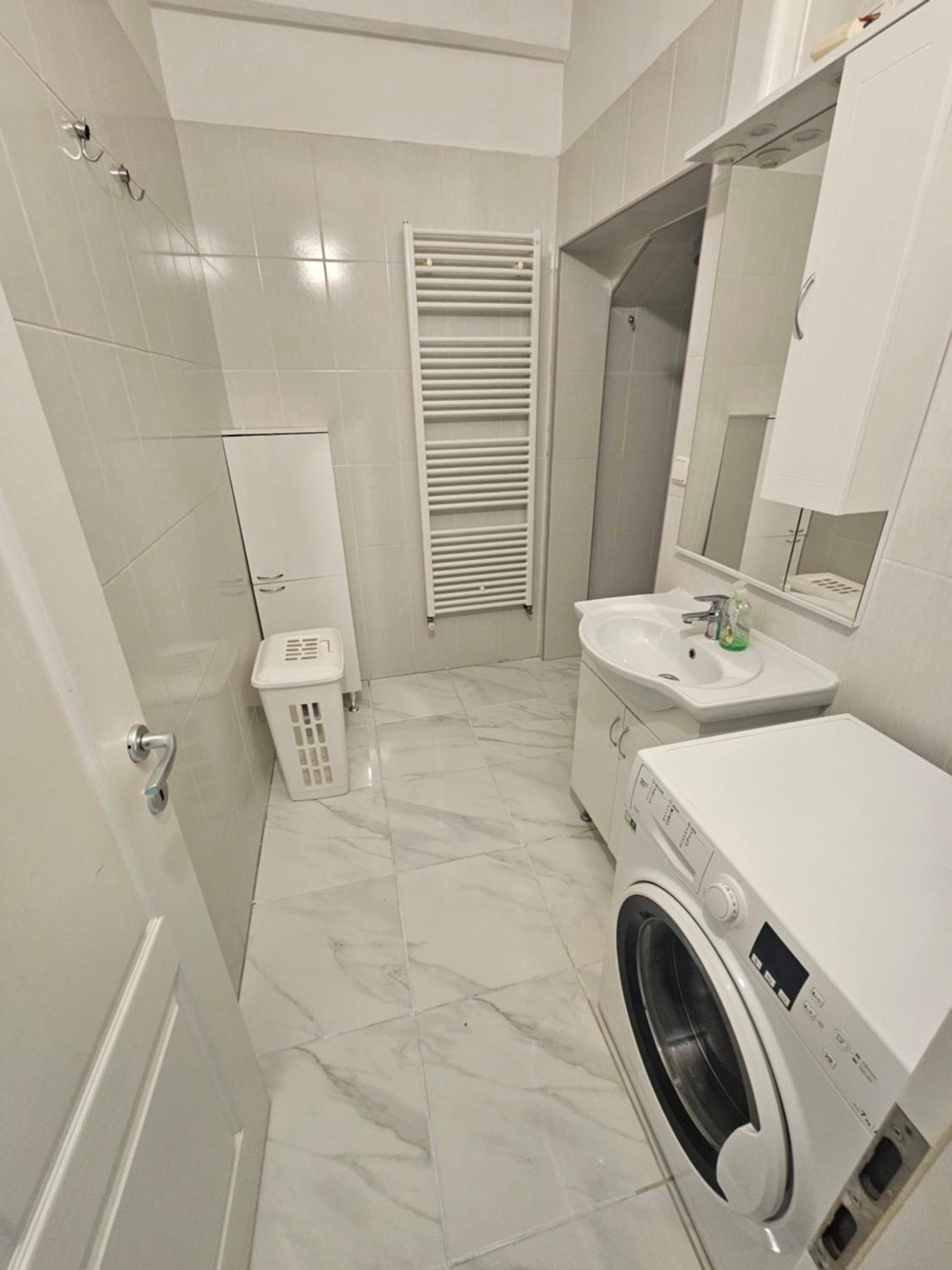Three-Bedroom Apartment - Photo 12