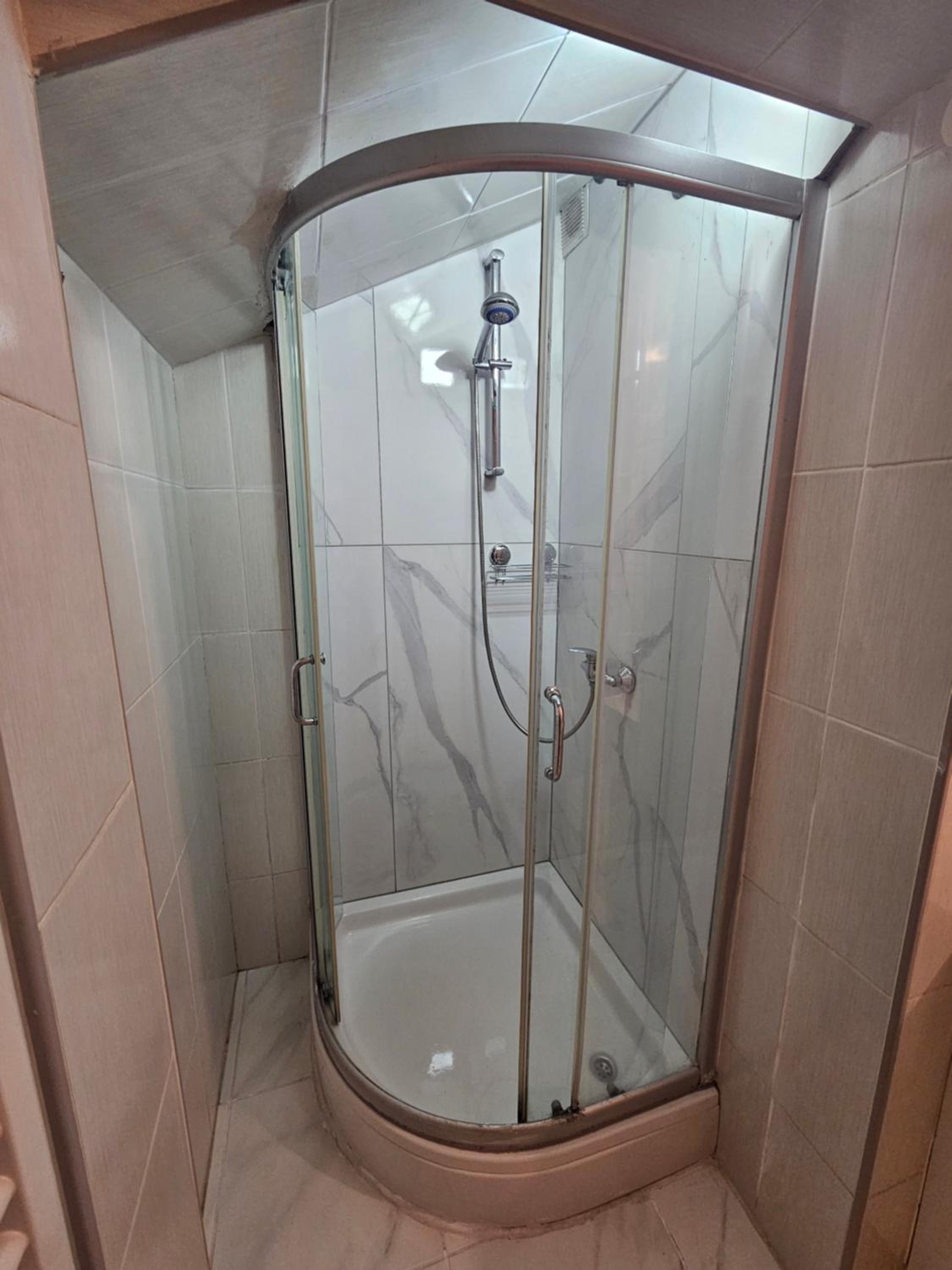 Three-Bedroom Apartment - Photo 11