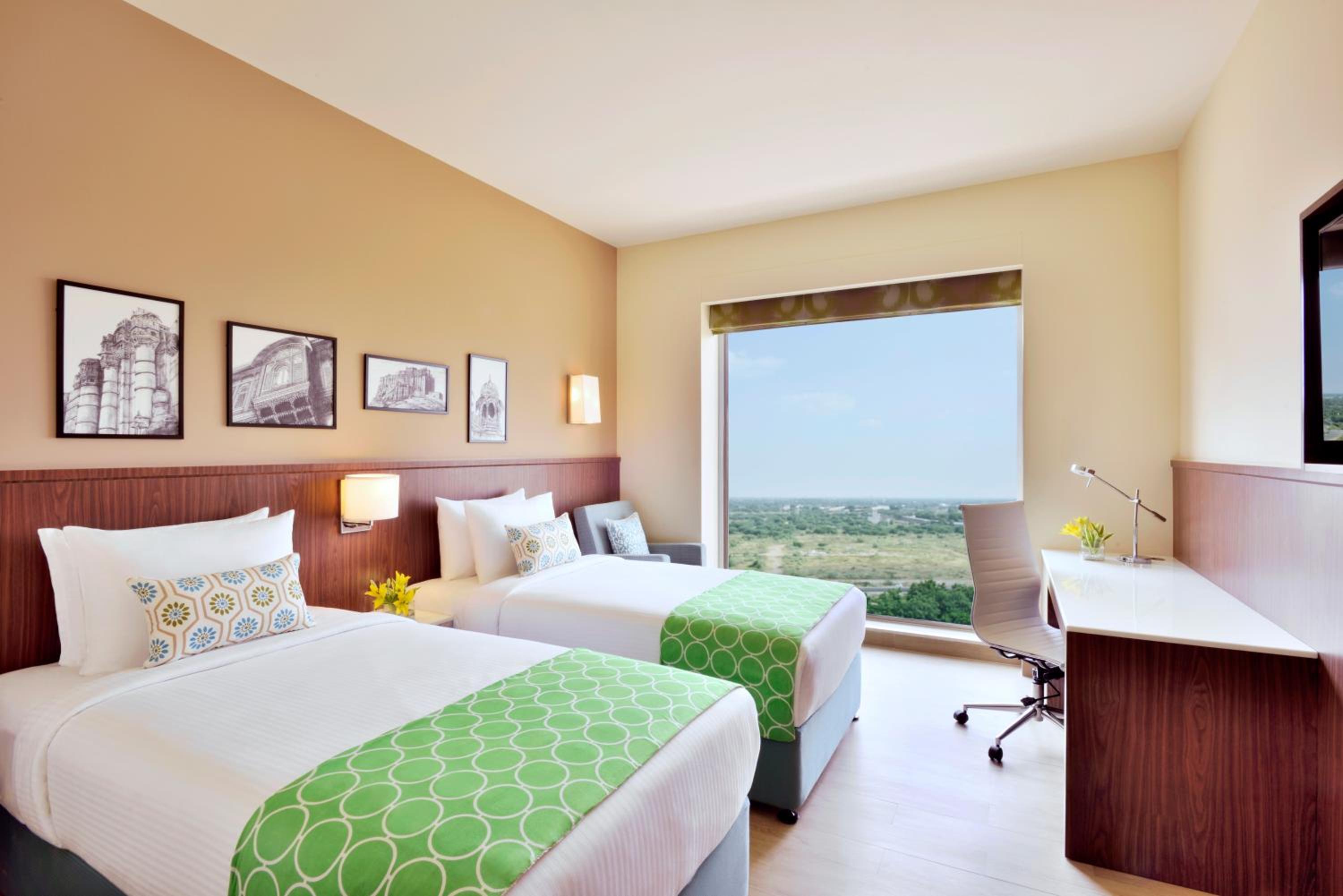 Premium Twin Room (15% Discount on food & soft beverage at Kava Restaurant, Happy Hours (Buy 1 Get 1) on IMFL beverages at the BAR) photo 2